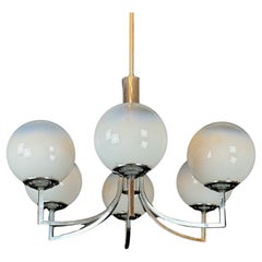 Six arms chandelier in murano glass spheres and chrome. Italy 1960s