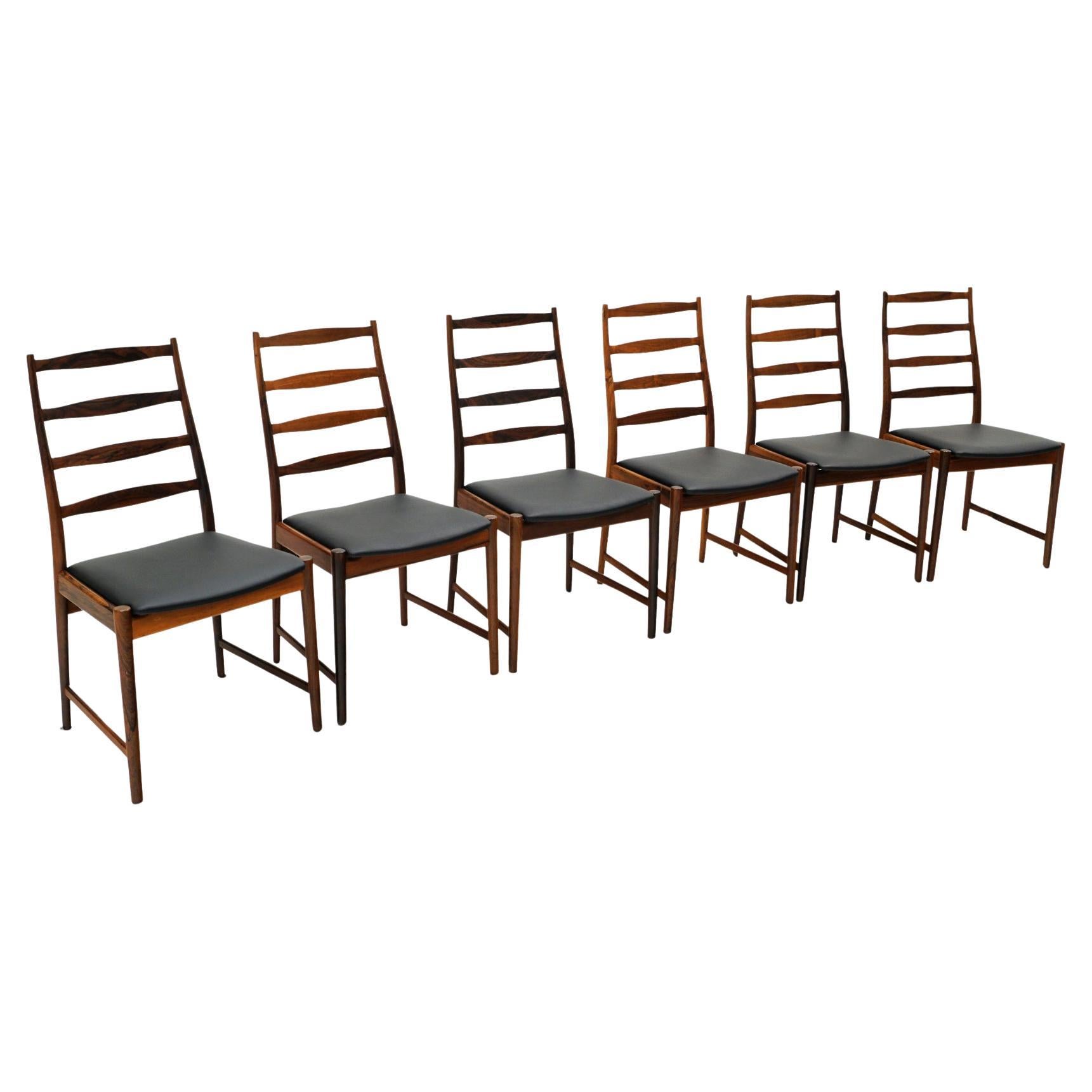 Six Arne Vodder Dining Chairs in Brazilian Rosewood and Black Leather.  Signed.