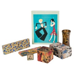 Seis cajas con motivos art déco, una caja de John Held Jr. y un jarrón art déco decorado