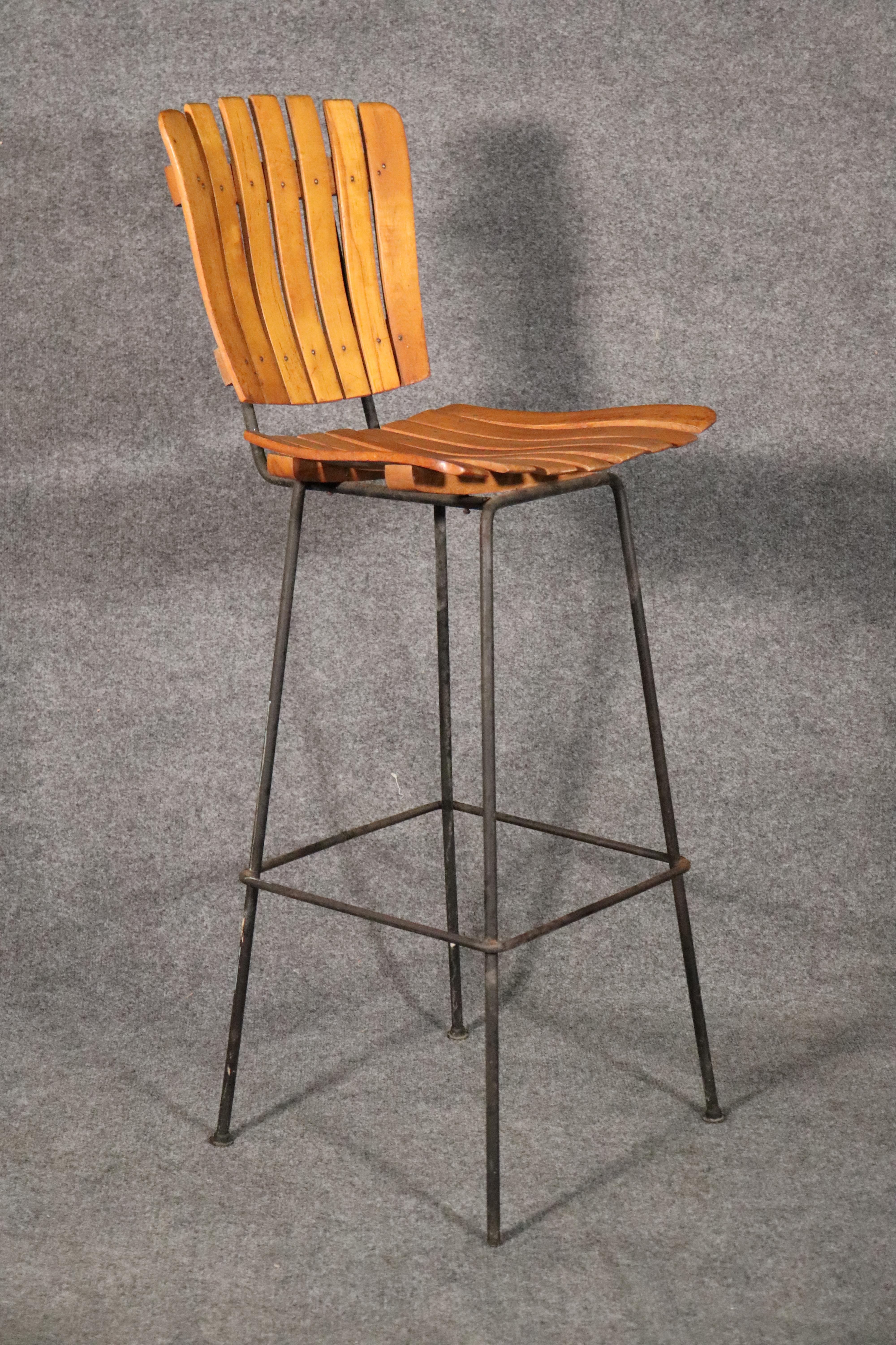 Set of six Mid-Century Modern slat stools designed by Arthur Umanoff for Shaver Howard. Strong iron frames with slat wood seat and backs.
Please confirm location.