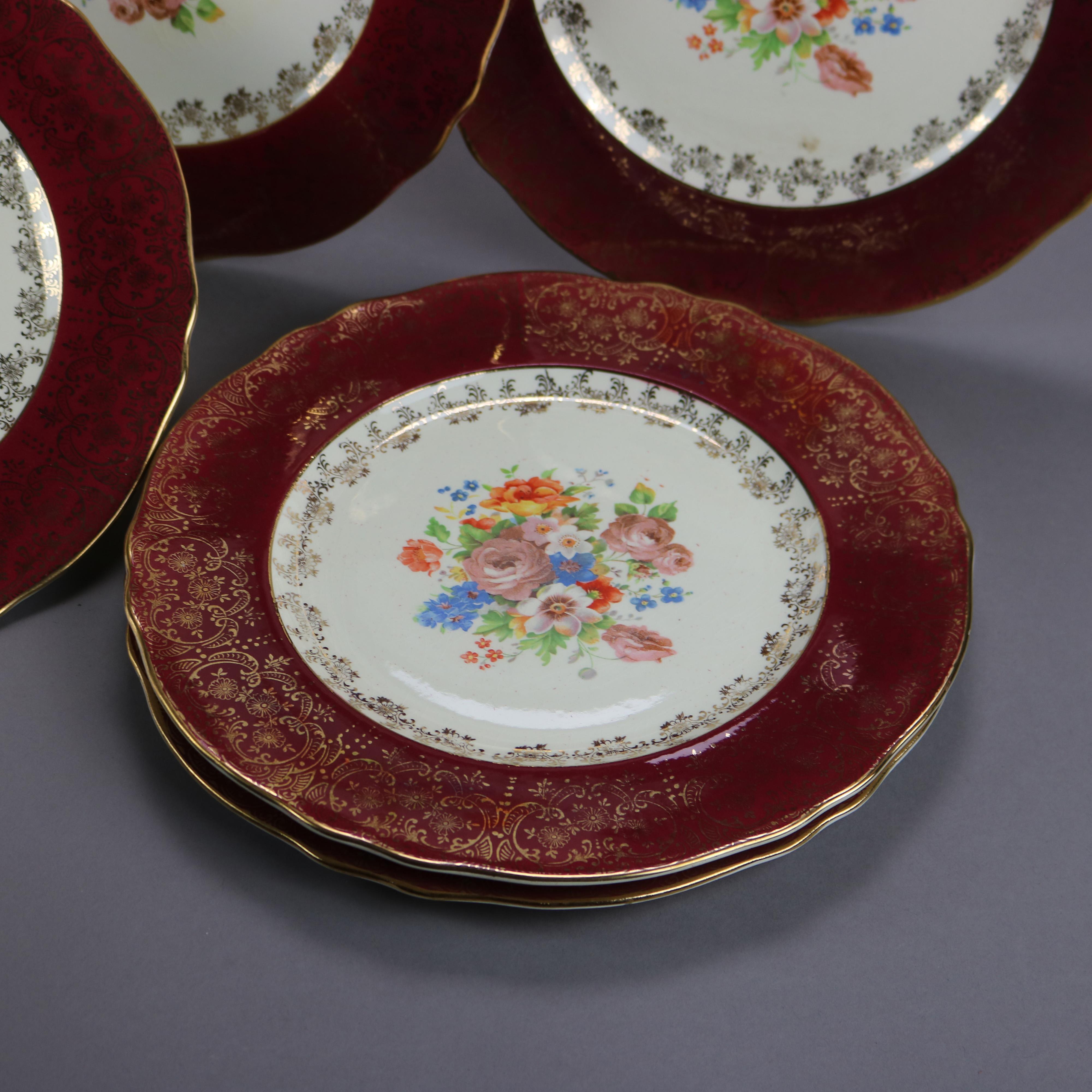Américain Six assiettes plates Atlas en porcelaine bordeaux et dorée avec puits à fleurs en vente