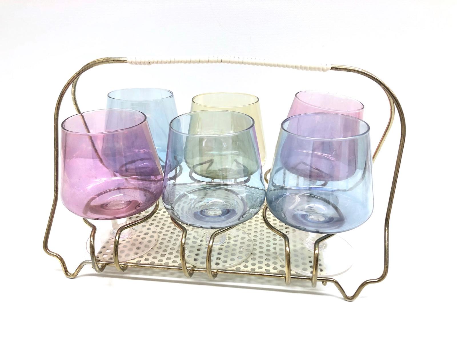 A Mid-Century Modern Barware caddy or display Stand. It holds six cognac snifters glasses. It is made of brass wire, plastic string handle and mouth blown glasses. Each glass is approximate 3 ¼