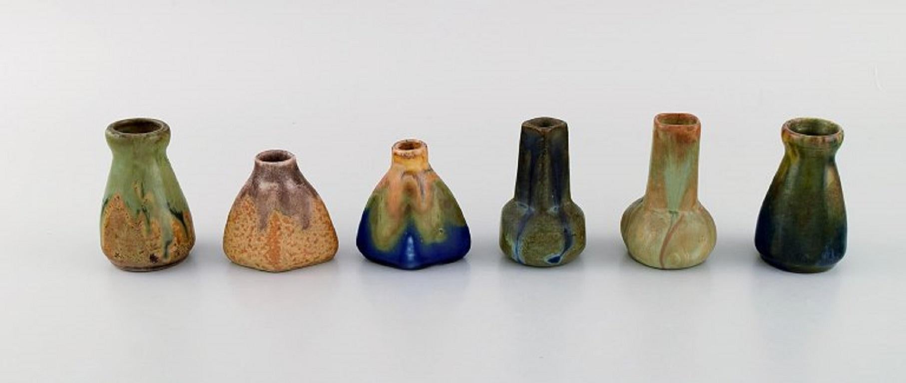 Six Belgian miniature vases in glazed ceramics. Mid-20th century.
Largest measures: 7 x 4.8 cm.
In excellent condition.