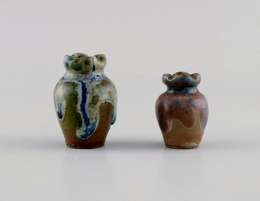 Six Belgian miniature vases in glazed ceramics. Mid-20th century.
Largest measures: 4.5 x 3.5 cm.
In excellent condition.