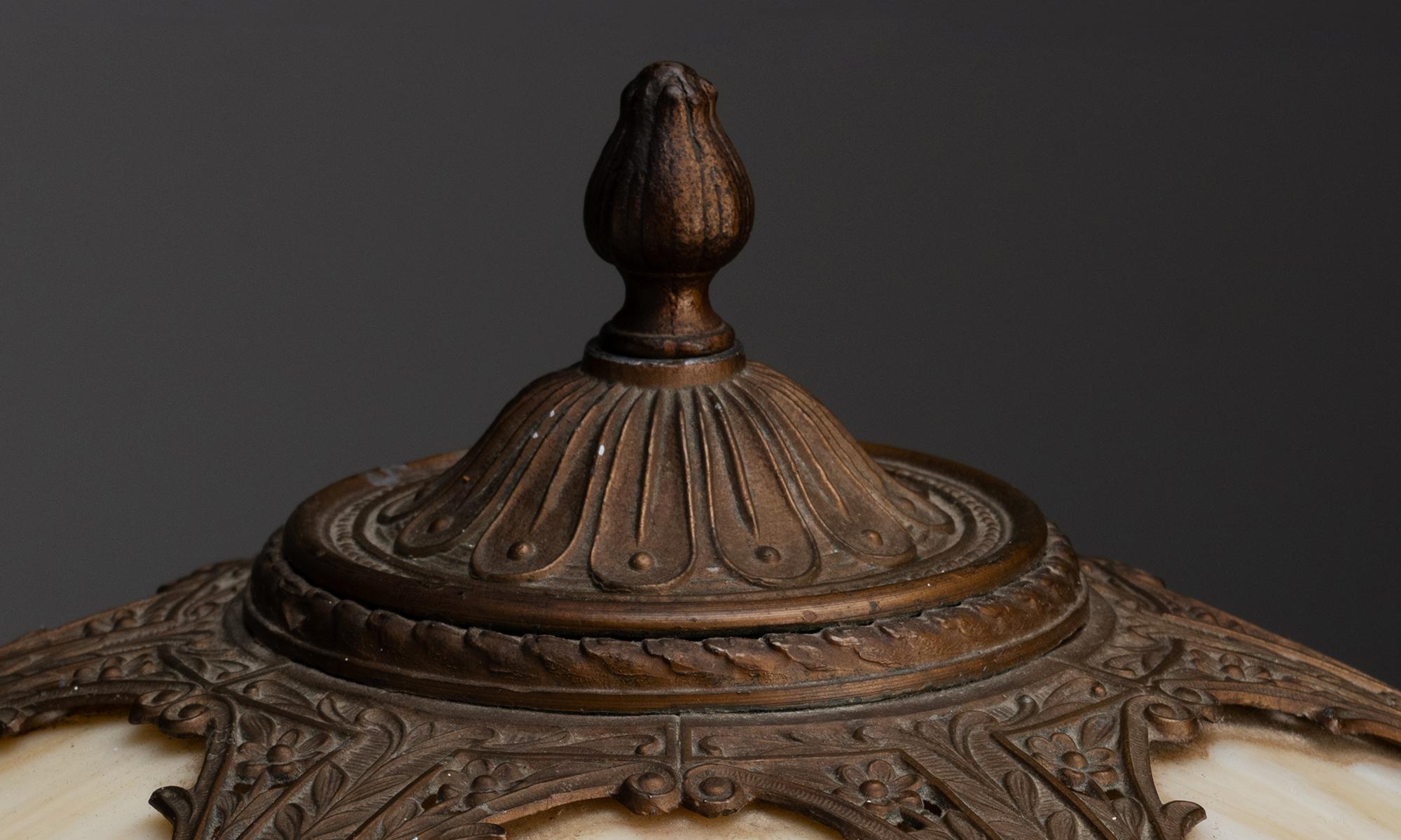 American Six Bent Panel Metal Overlay Slag Glass Lamp, America circa 1920