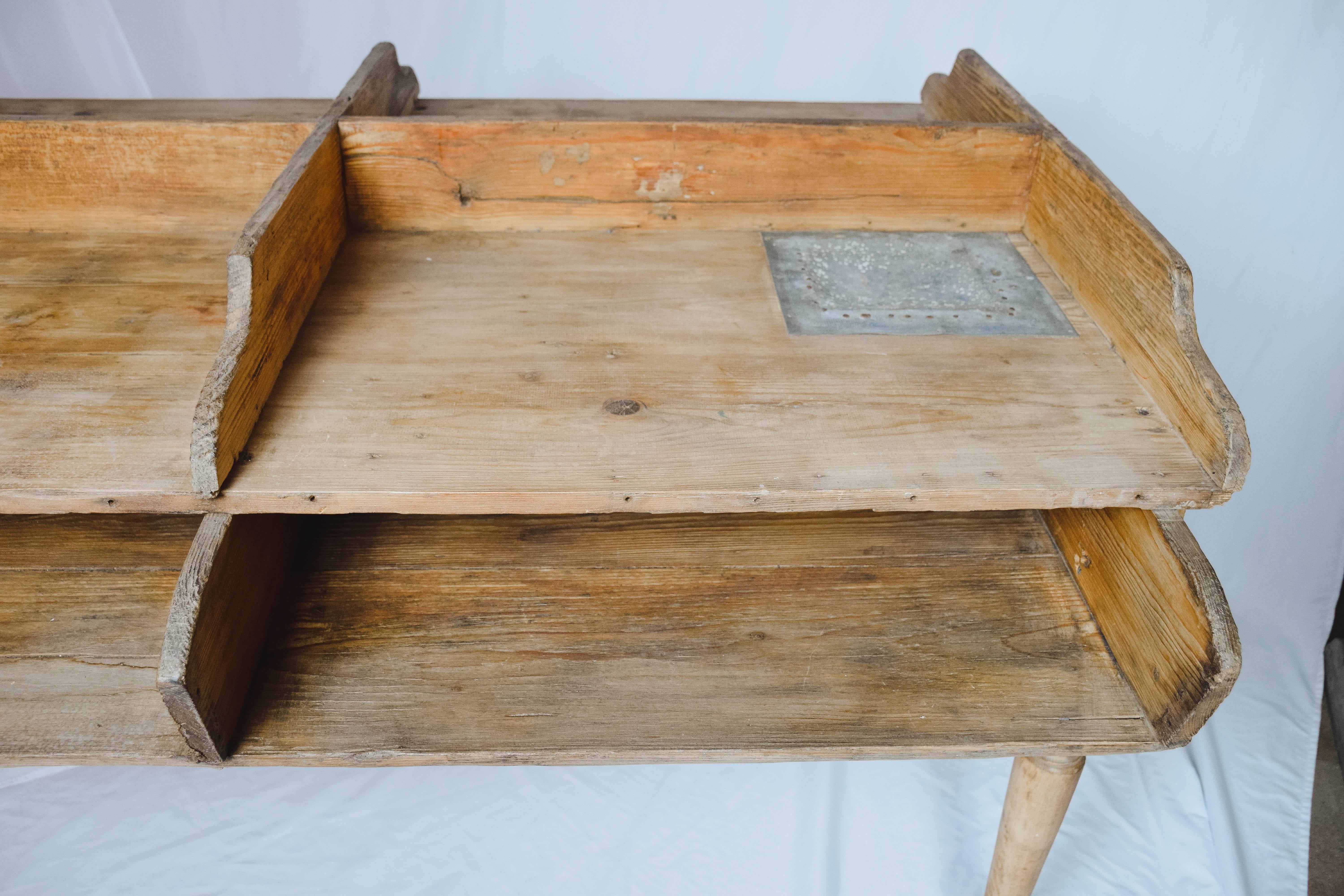 This Six Bin Cigar factory table was used to hand roll cigars in a German factory. Cuban cigars were very popular in Germany, who had strong business ties with Cuba. In Germany, the habano-type Cuban cigars had a very good market and In the late