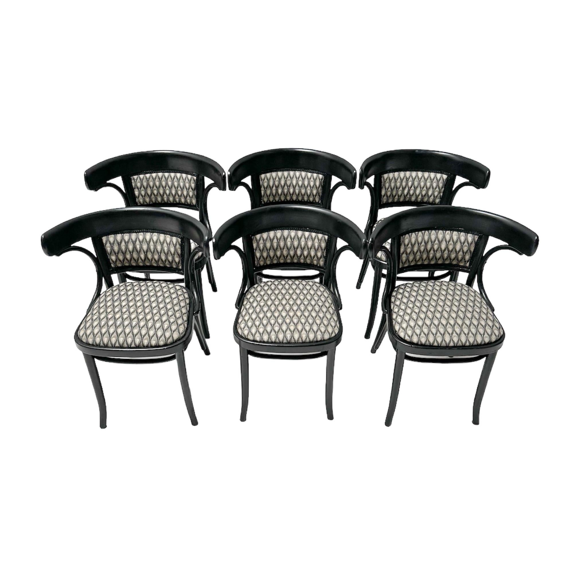 Magnificent and rare set of six Vienna Secession armchairs.
Design by Gebrüder Thonet Austria.
Striking Austrian design from the 1920s.
Original black lacquered beech frames and backs and seats are re-upholstered with a quality Backhausen 