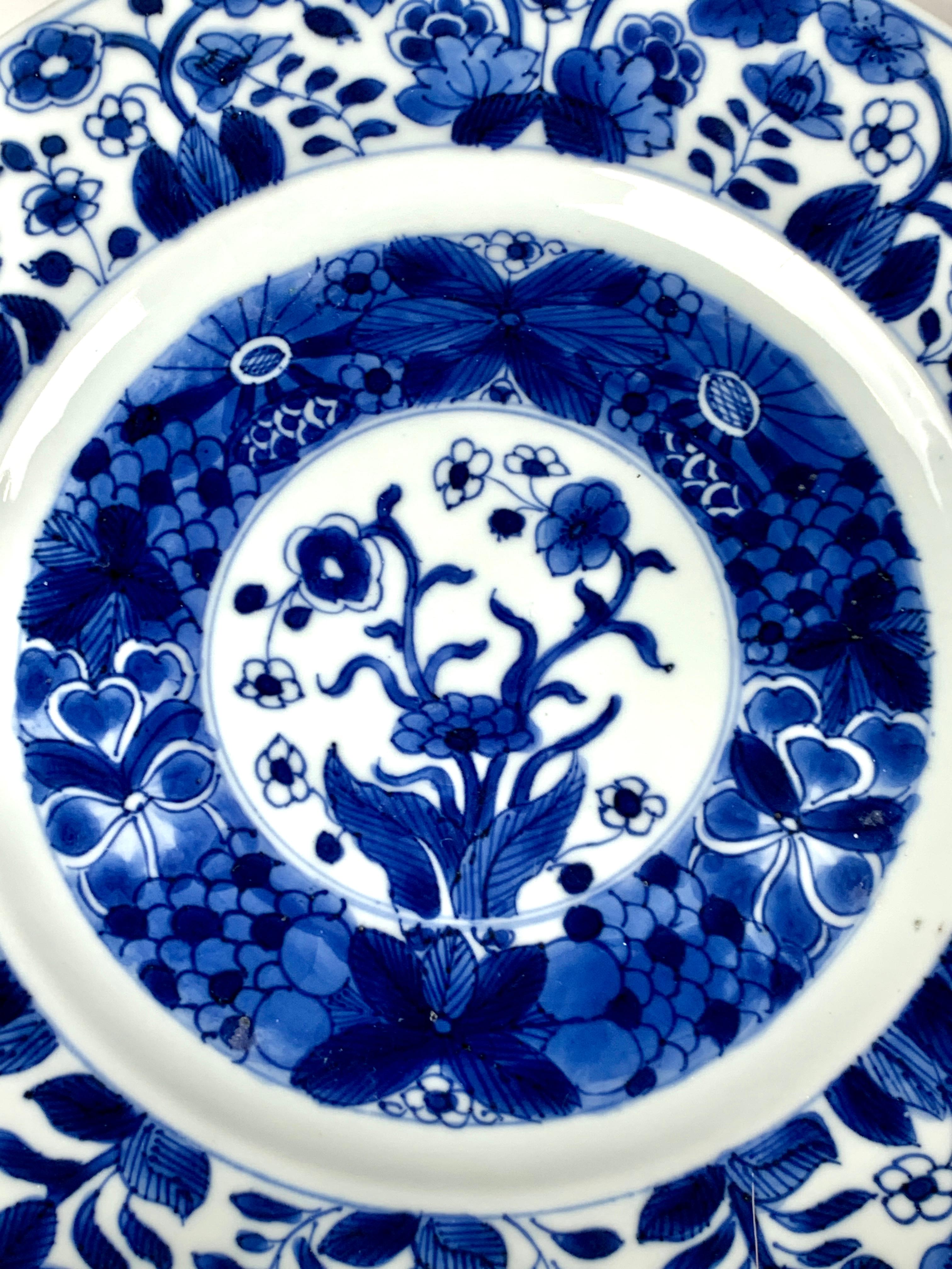 This set of six blue and white Chinese porcelain dishes was hand-painted 300 years ago, circa 1700, during the Kangxi dynasty. According to Sir Harry Garner, author of 