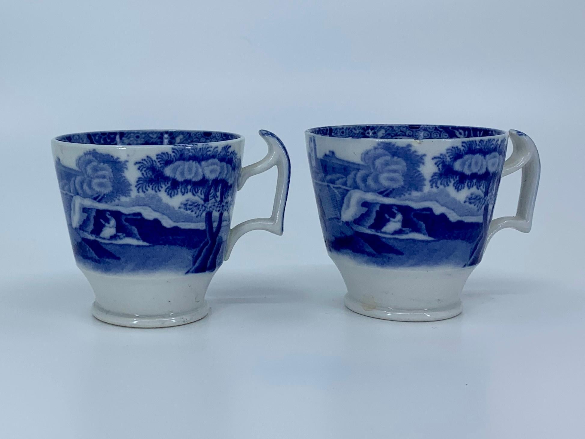 Six blue and white espresso cups. Assembled set of three pairs of English espresso cups and in rich blues and white featuring Italian landscapes, chinoiserie birds and chinoiserie reserves within pebbled field. The grouping includes:
Two blue and