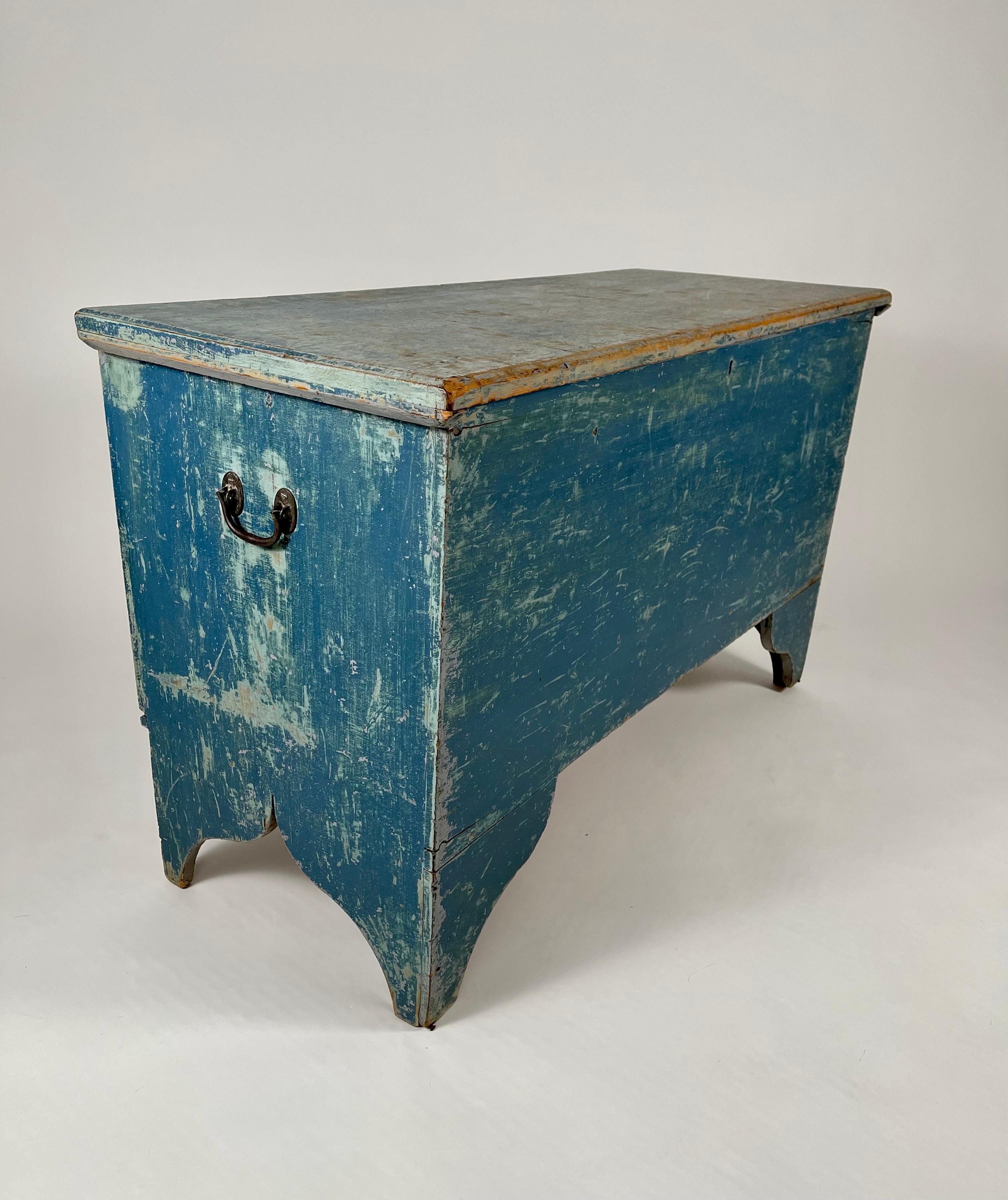 A six-board blanket chest in original, old blue paint with boldly shaped bracket feet and blacksmith-made original hinges. American, circa 1830. Found in Guilford, CT.


 