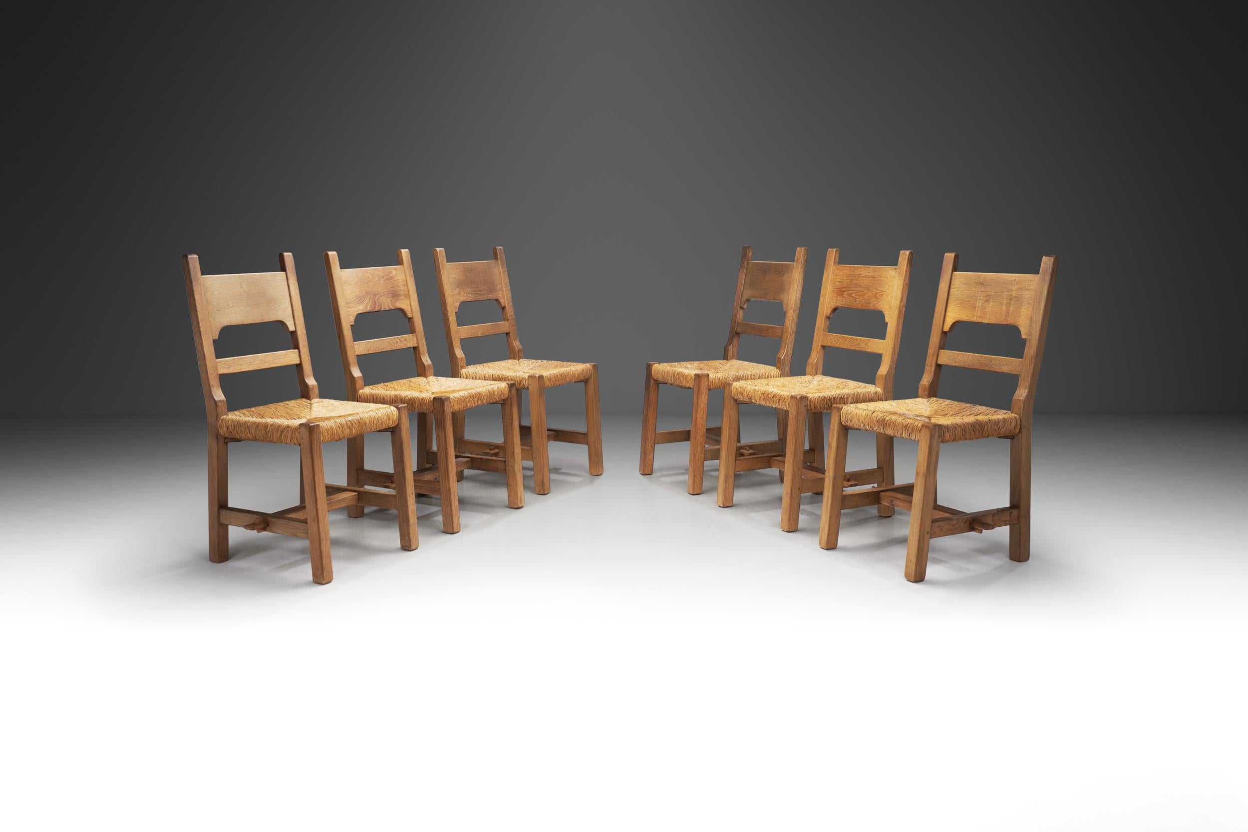 In mid-century furniture design, the marriage of organic materials and the brutalist style found its apotheosis in pieces such as this set of six chairs. These chairs, each a testament to the craftsmanship of the era, stand as paragons of brutalist