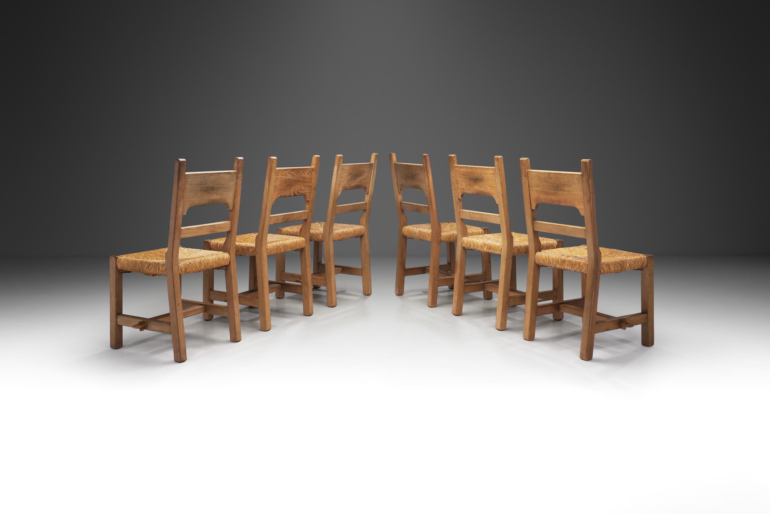 Mid-Century Modern Six Brutalist Dining Chairs with Rush Seats, Europe ca 1960s For Sale
