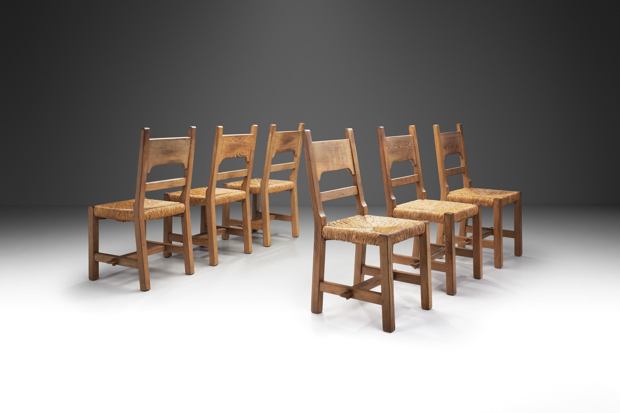 European Six Brutalist Dining Chairs with Rush Seats, Europe ca 1960s For Sale