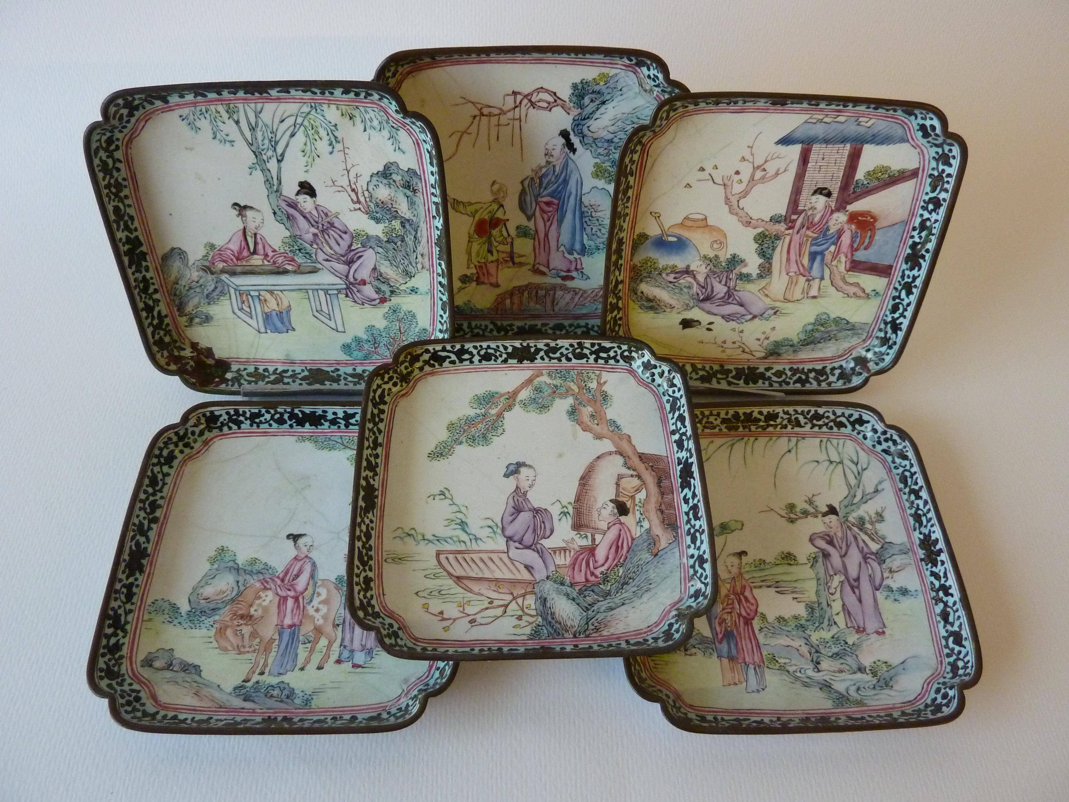 Square, with incurved corners, the cups with a decoration in famille rose enamels of a landscape with a Chinese man lying against a rock talking to a Chinese man and Chinese boy, one cup with different decoration, the saucers all with different