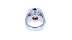 Six Carat Fancy Deep Orange Yellow Diamond Ring with Triple Shank & Diamond Pave