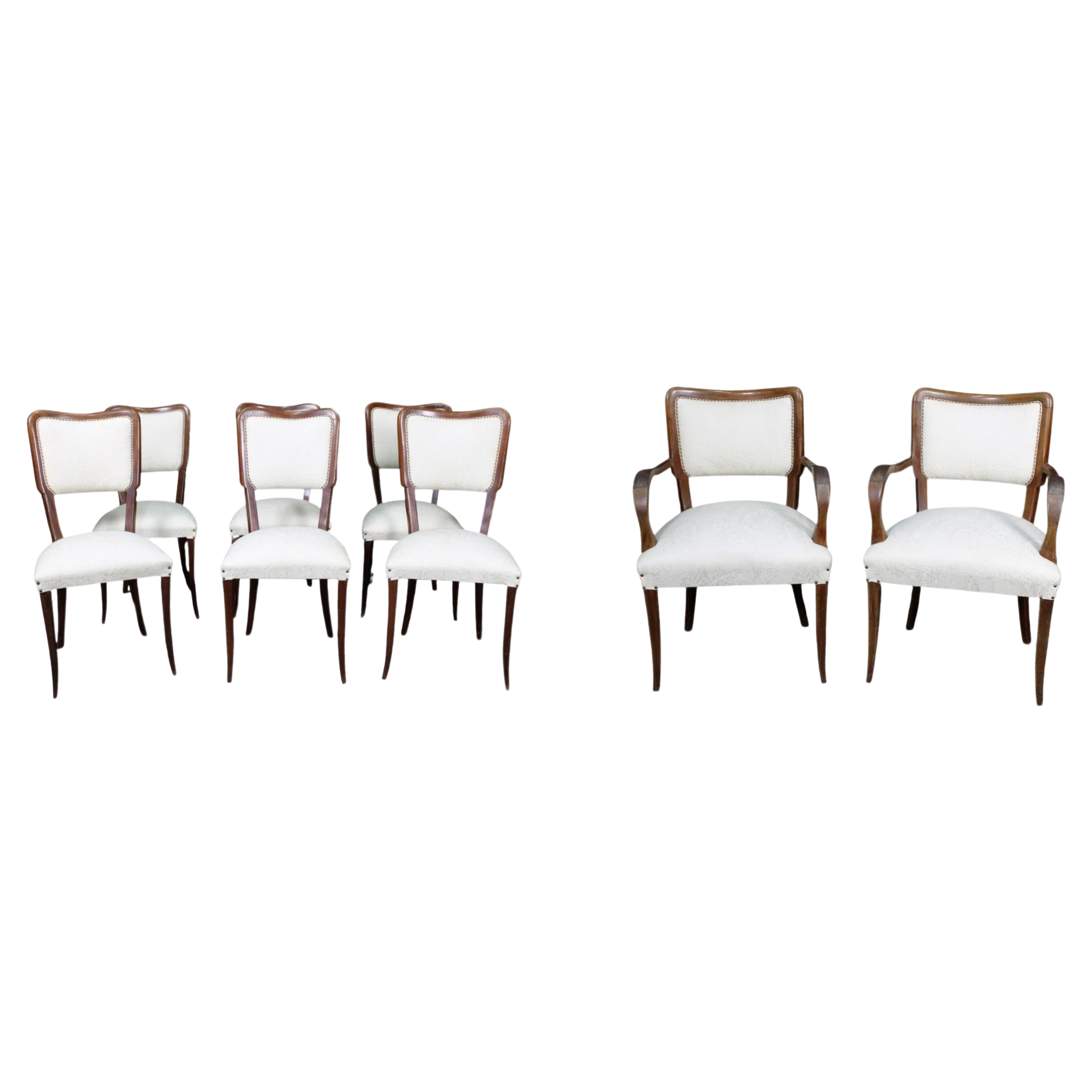 Six chaises et une paire de fauteuils italiens du 20e siècle en vente