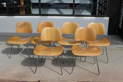 Six Charles and Ray Eames DCM Chairs