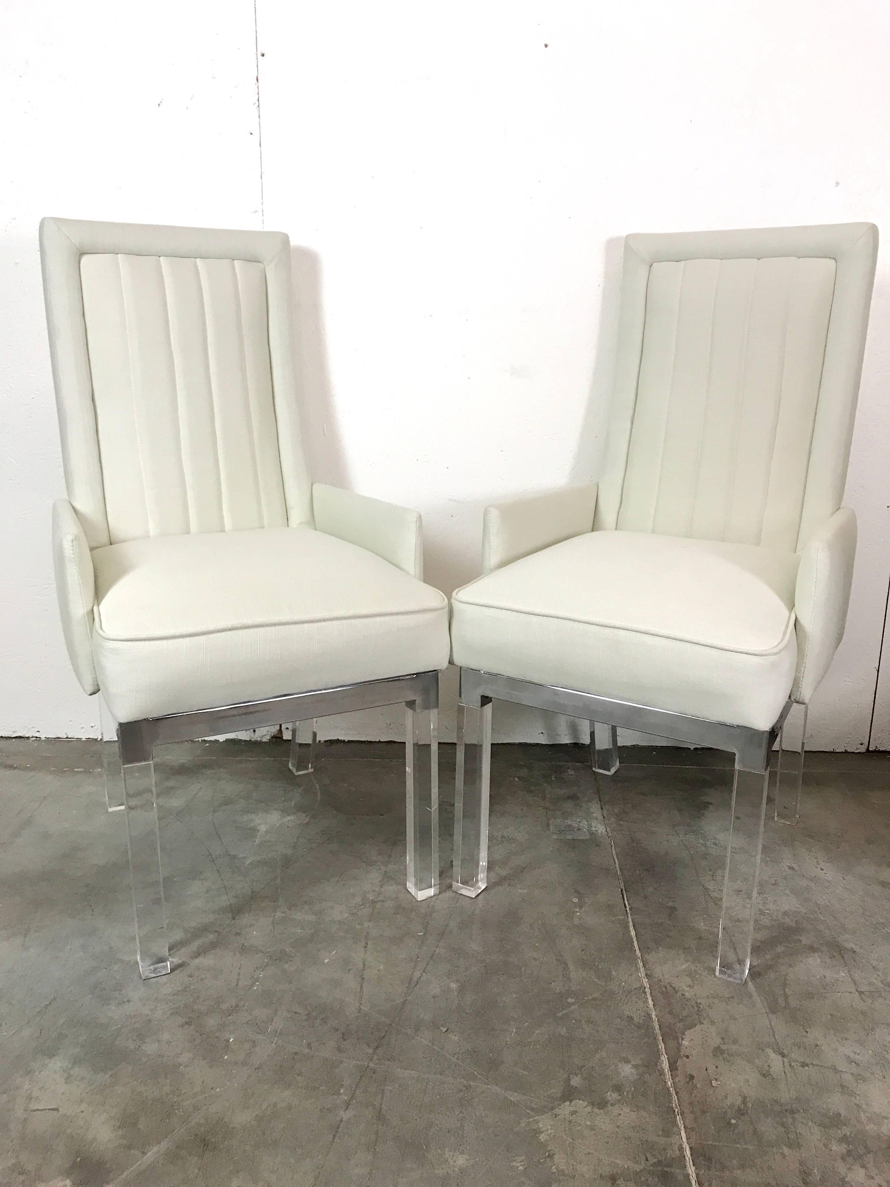 Six Charles Hollis Jones Lucite dining chairs, consisting of two armchairs and four side chairs, newly upholstered 
Armchairs measure 40