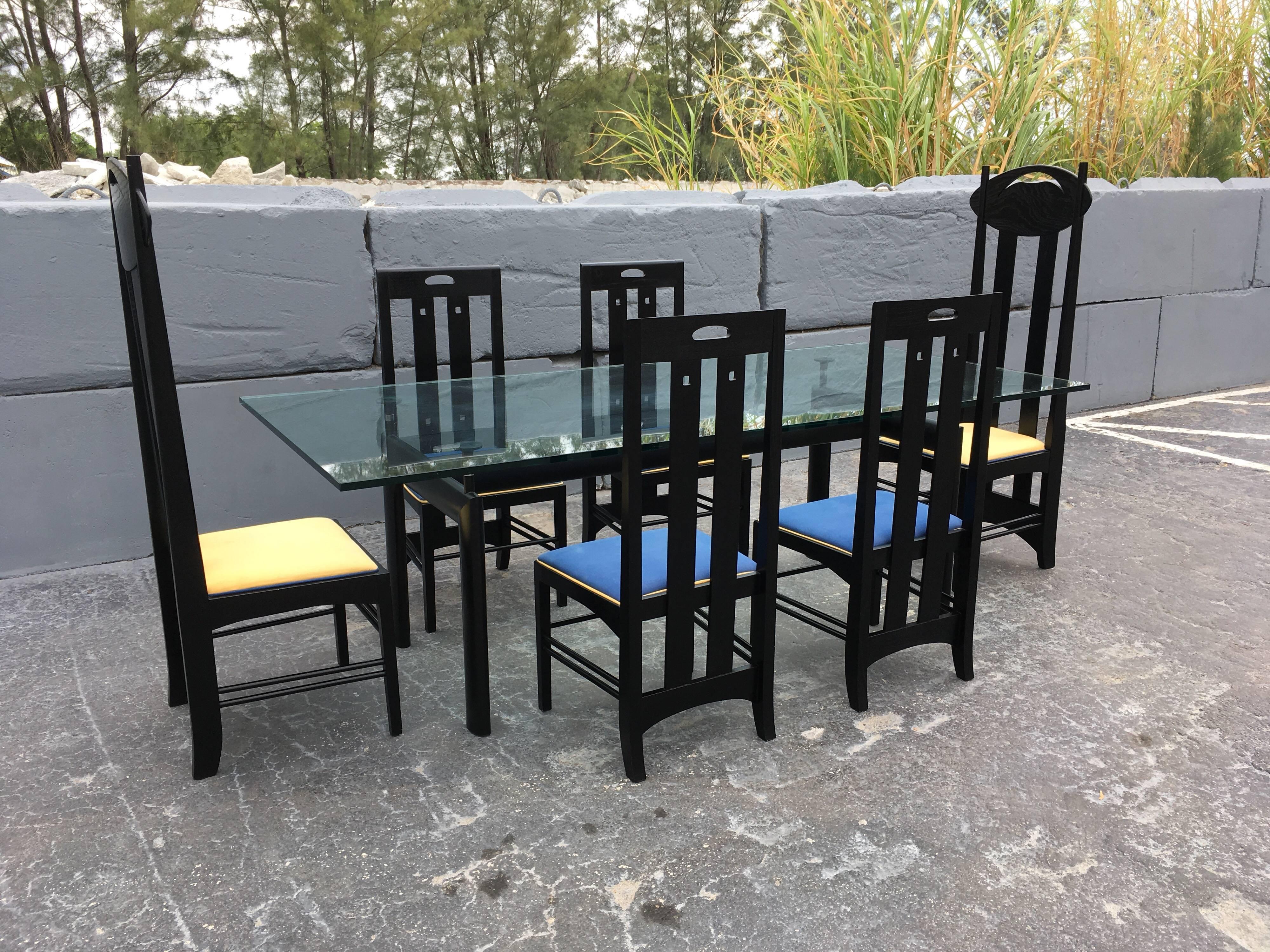 Six unsigned Charles Rennie Mackintosh chairs, four side chairs and two tall back chairs. The seats need to be reupholstered. Tall back chairs are 54