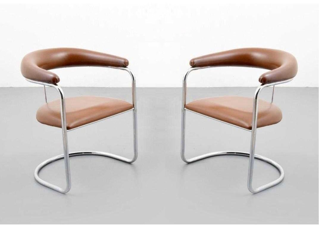 Set of six armchairs designed by Anton Lorenz for Thonet. Each chair has tan upholstered backrest and seat with polished chrome tubular frames.

Mid-Century Modern S-37 chairs were originally designed by Anton Lorenz in 1929 and later manufactured