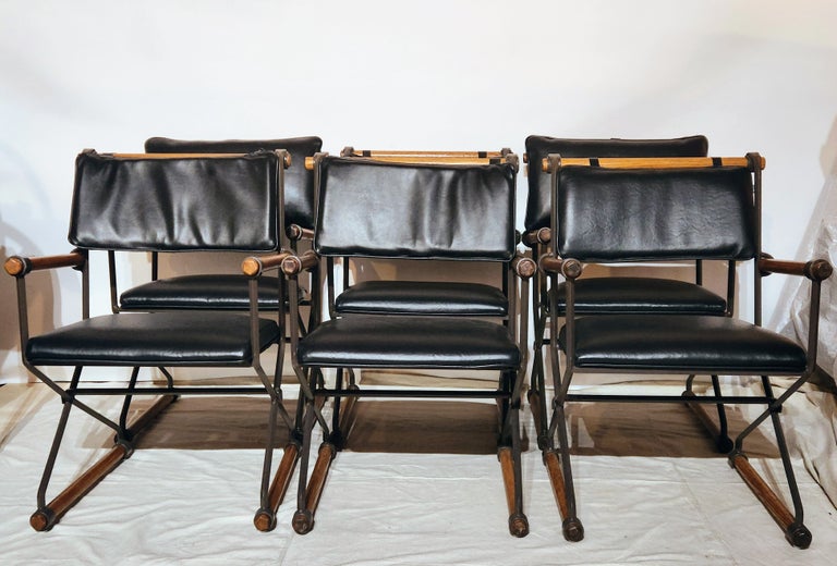 Six Cleo Baldon armchairs from her Villa group manufactured by her company Terra in the mid-1960s thru the mid-1970s.
The wrought iron chairs are lacquered in their original warm chocolate color with fumed oak rods.
A variant of this chair was