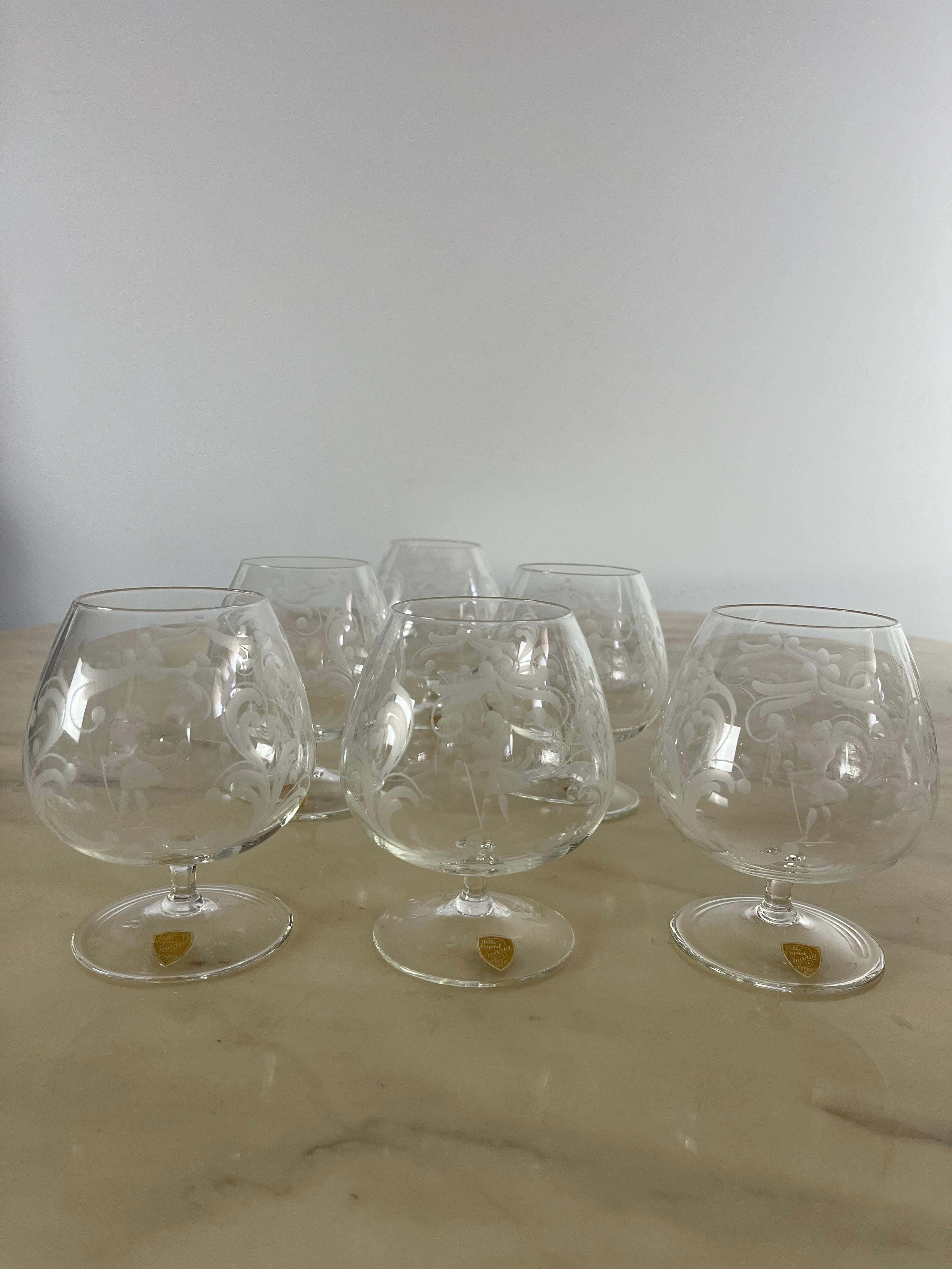Six cognac glasses in hand-engraved crystal, Venice, 1960s.
Intact, always kept and never used. Very light, probably blown glass. Hand engraved. The diameter is 10 cm in the most pot-bellied part; The mouth has a diameter of 6 cm.
Very small signs