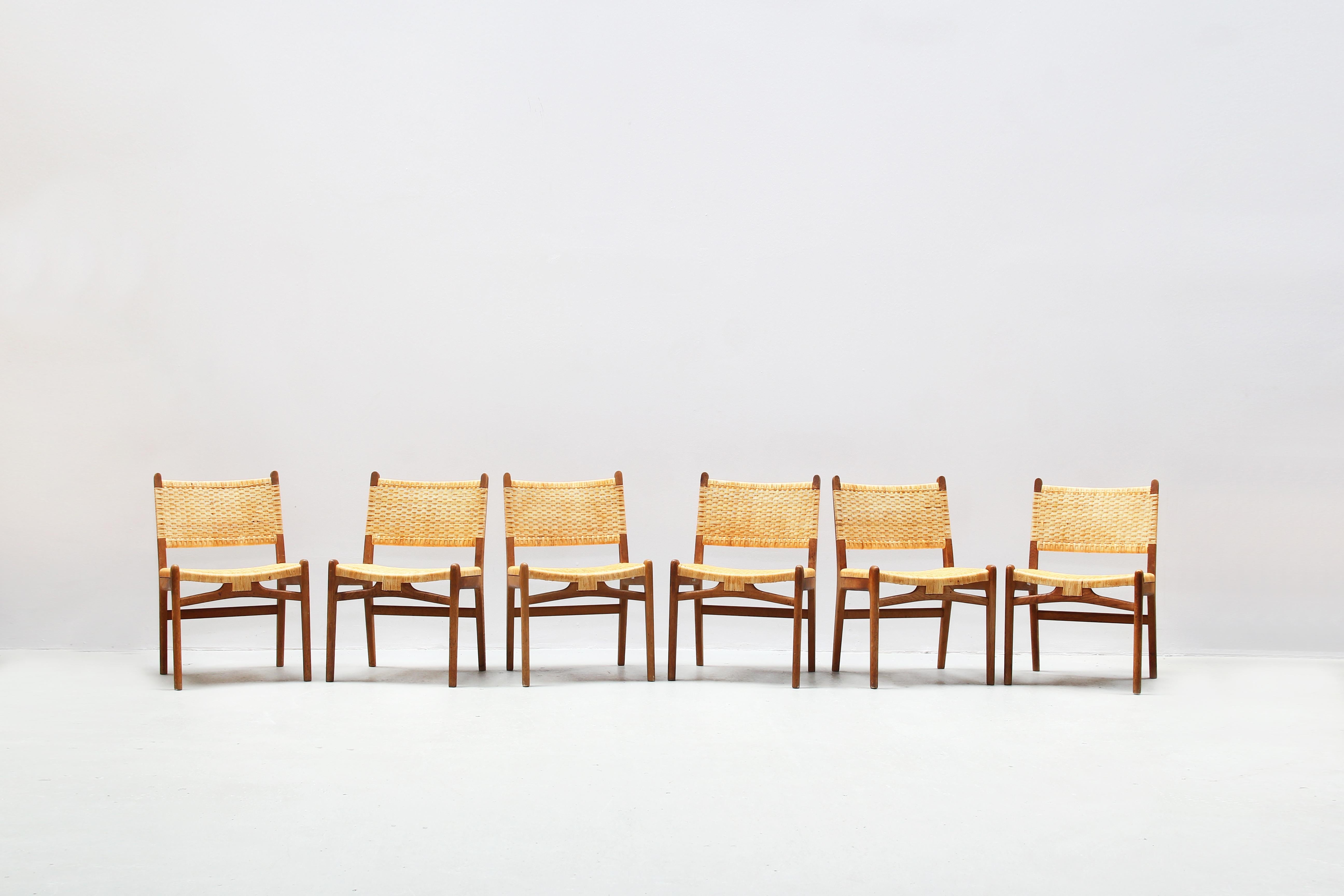 A beautiful set of six dining chairs designed by Hans J. Wegner and produced by Carl Hansen in Denmark, 1960s.
All chairs are in a very good condition - without any defects on the cane or on the oak frame. Labeled with the original tag of the