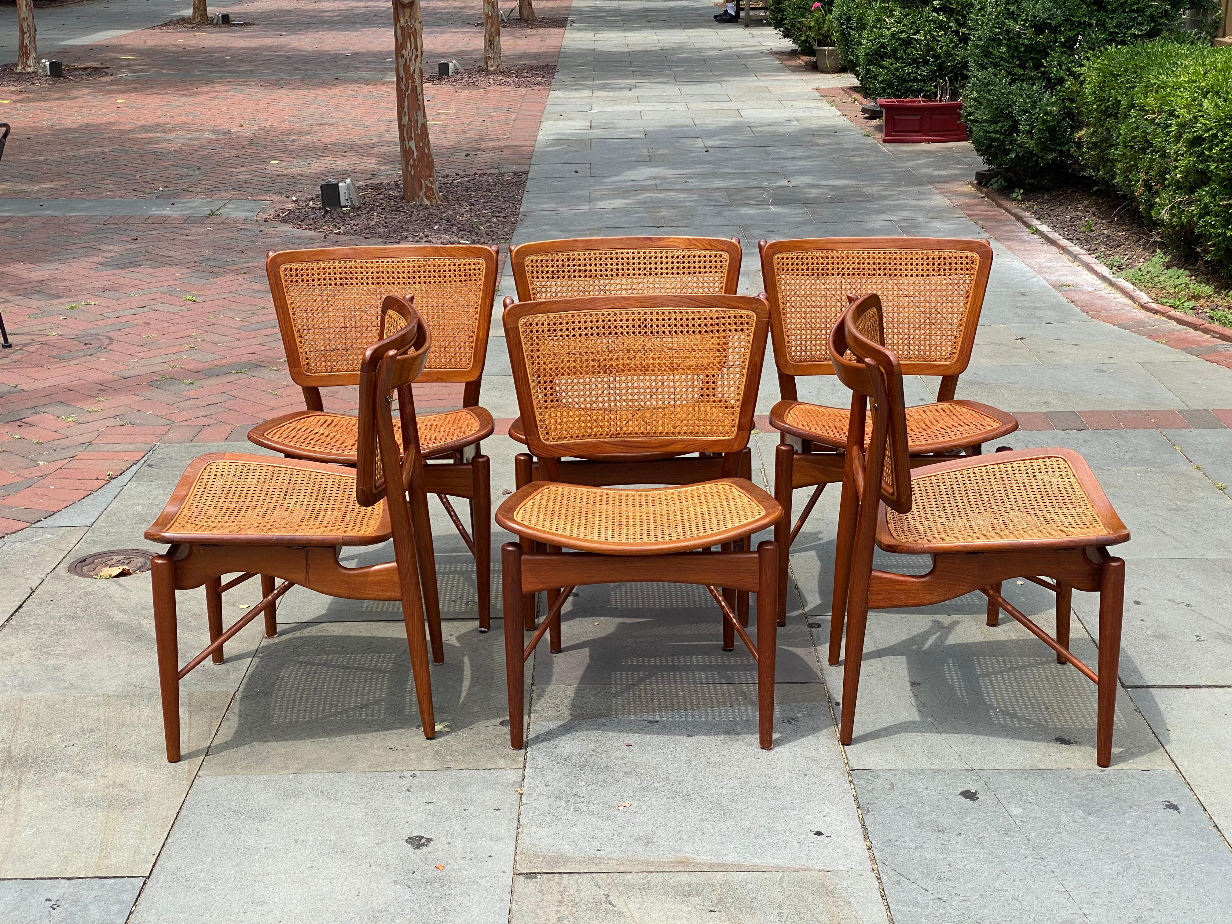 Set of six Finn Juhl for Baker Mid-Century Modern dining room chairs

This rare set is in the original period cane seat and backed upholstery. All chairs are in good condition.



   