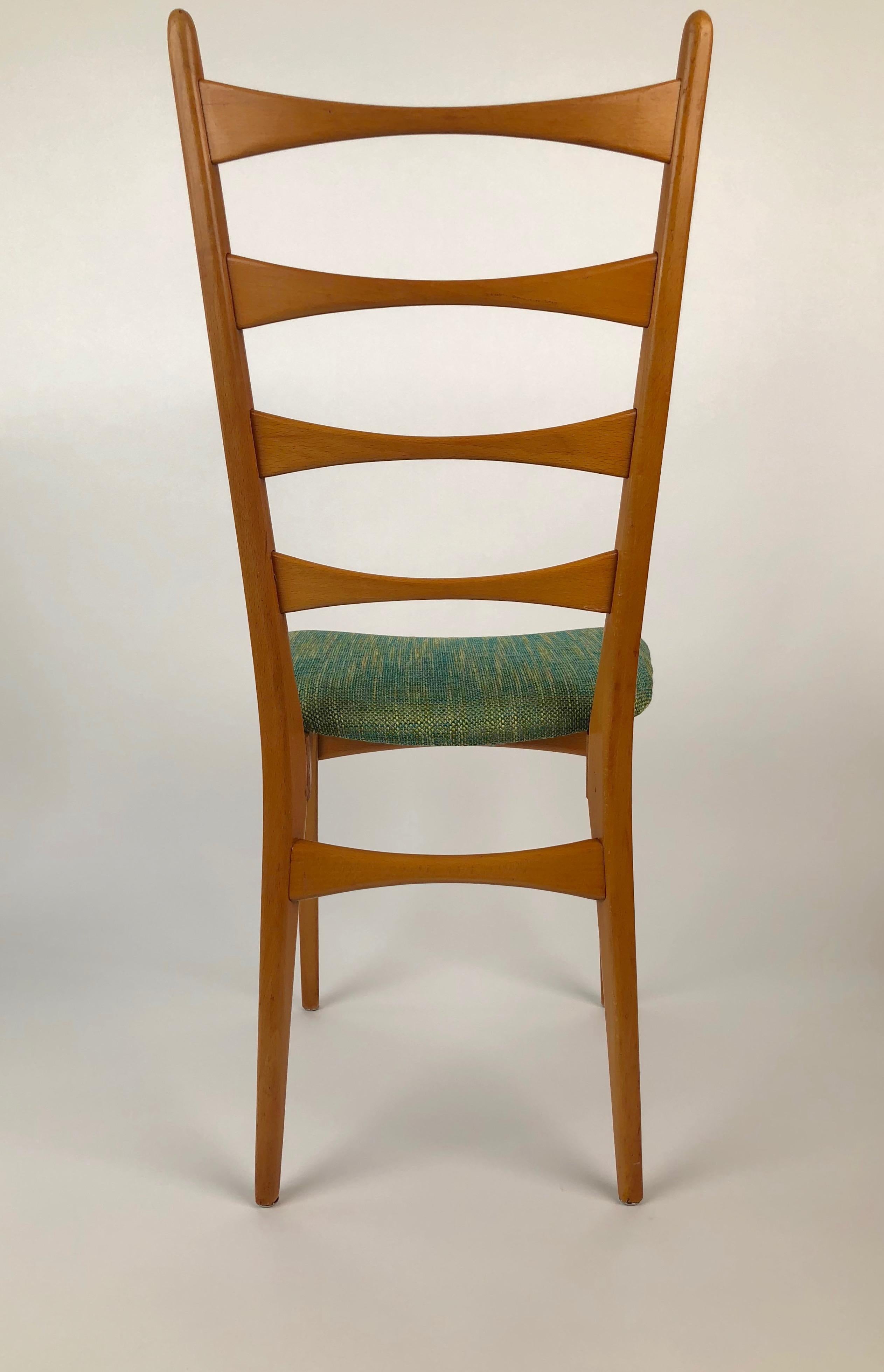 Very nice set of six Danish midcentury ladder back dining chairs from 1955, with new upholstery.
Overall, in very nice condition.