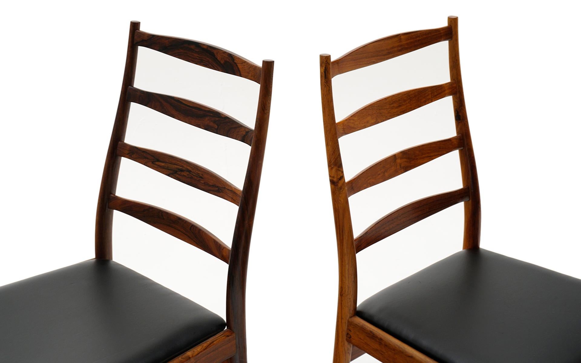 Mid-20th Century Six Danish Modern Rosewood Ladder Back Dining Chairs by Arne Vodder, Black Seats For Sale