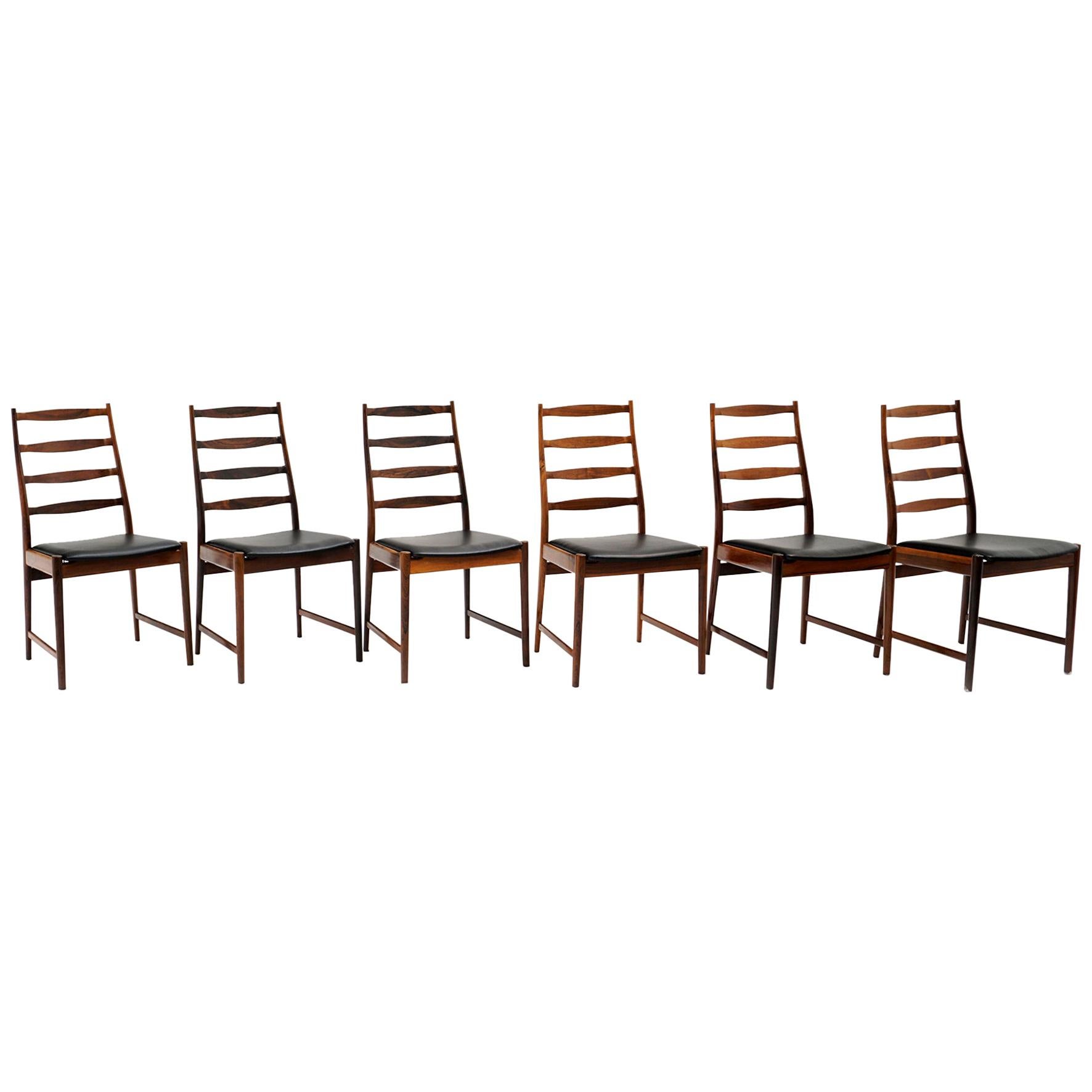Six Danish Modern Rosewood Ladder Back Dining Chairs by Arne Vodder, Black Seats