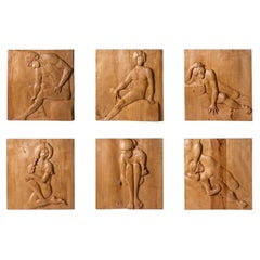 Six panneaux décoratifs en bois sculpté en bas-relief