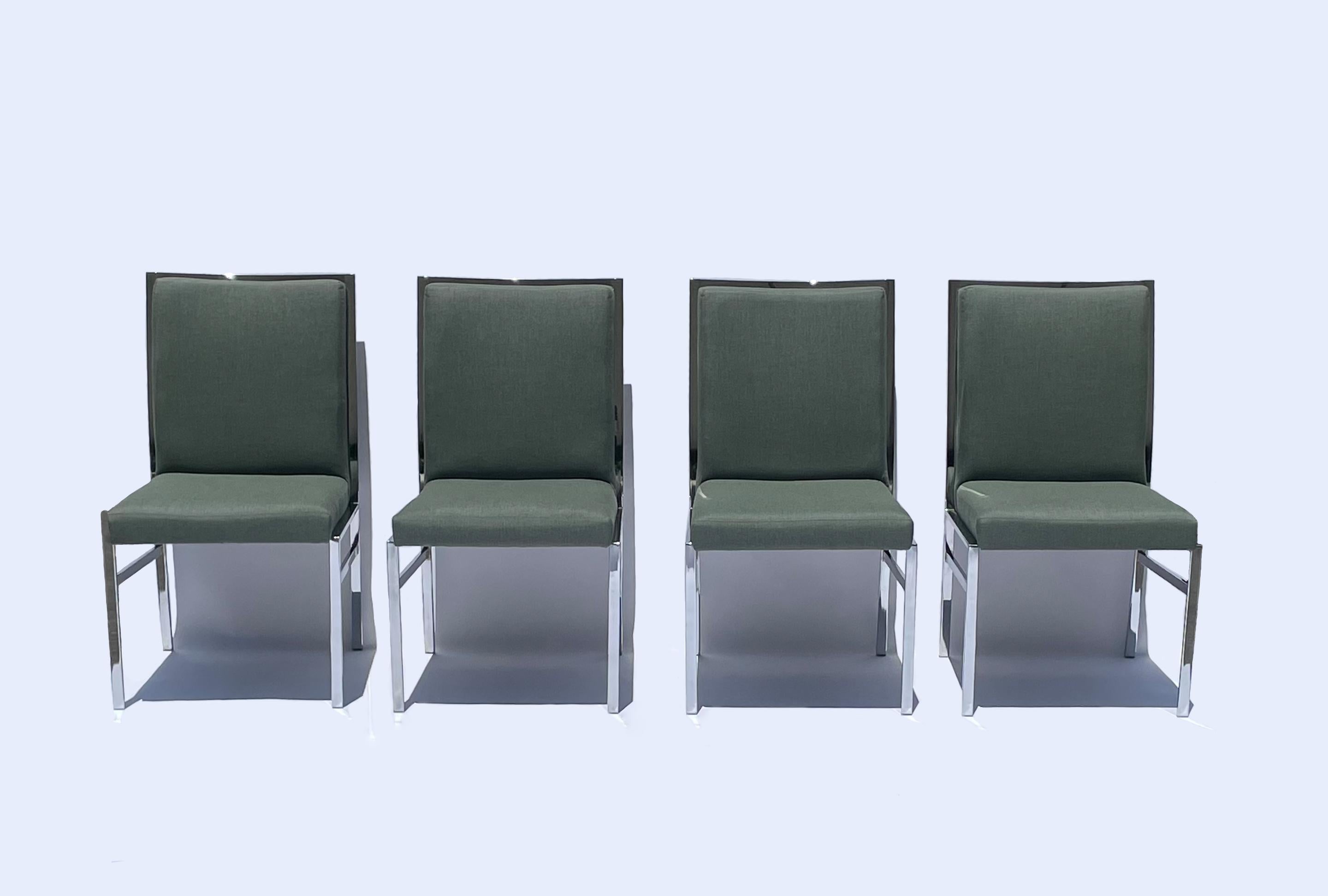 Six chromed metal dining chairs designed by Pierre Cardin for Dillingham, newly reupholstered in a neutral sage green fabric. There are four side/armless chairs and two captain chairs.

The matching extendable dining table is also. It has a