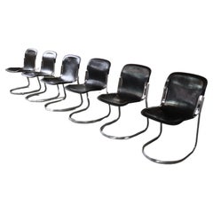Six dining chairs in black leather and chrome by Willy Rizzo for Cidue, Italy