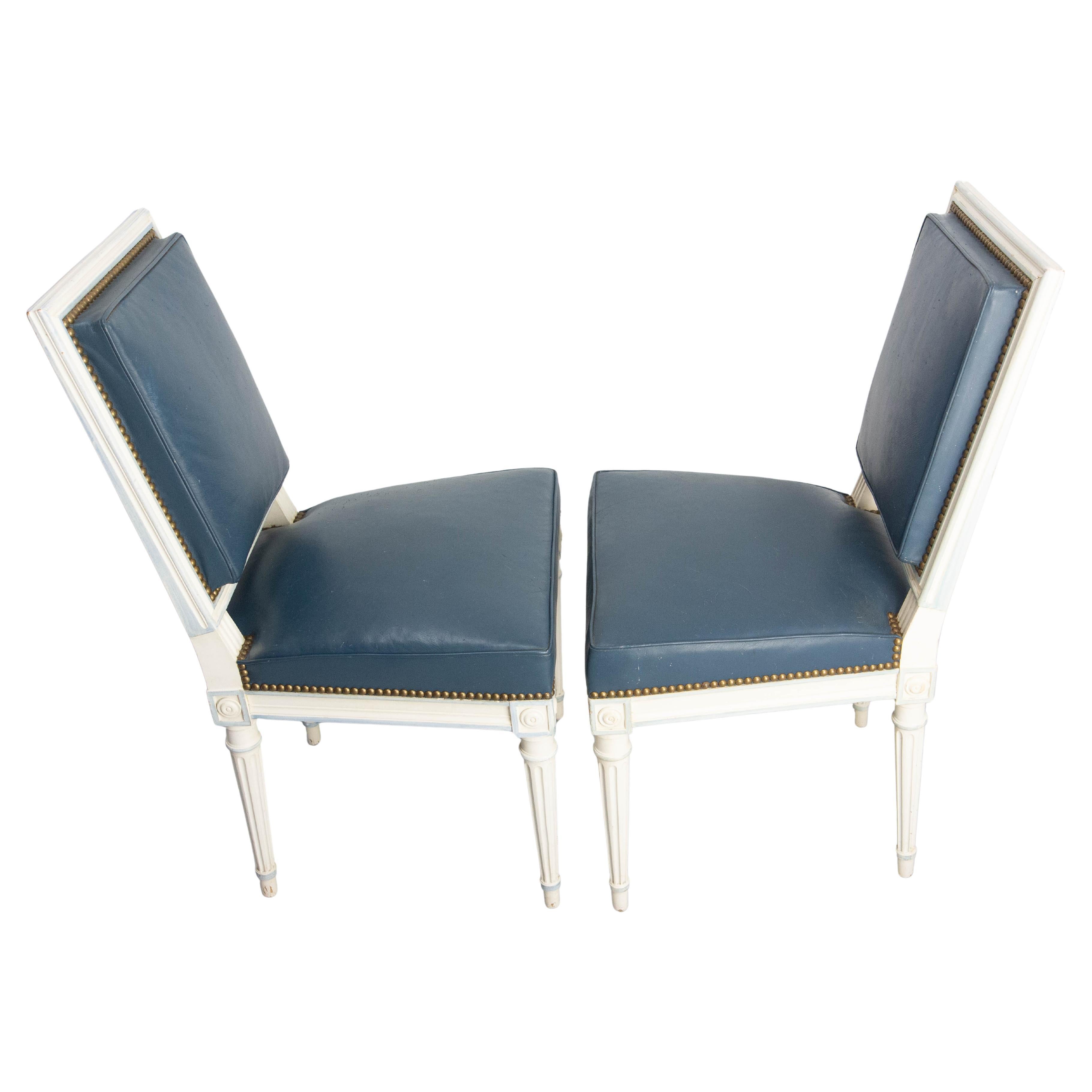 Set of six French dining chairs circa 1960 
Skai and painted wood. The skai has some cat scratches (please see photos) and can be used has it. You can also recover it if you wish.
Nice patina
In good condition solid and sound. 

Shipping:
L 143 P 66