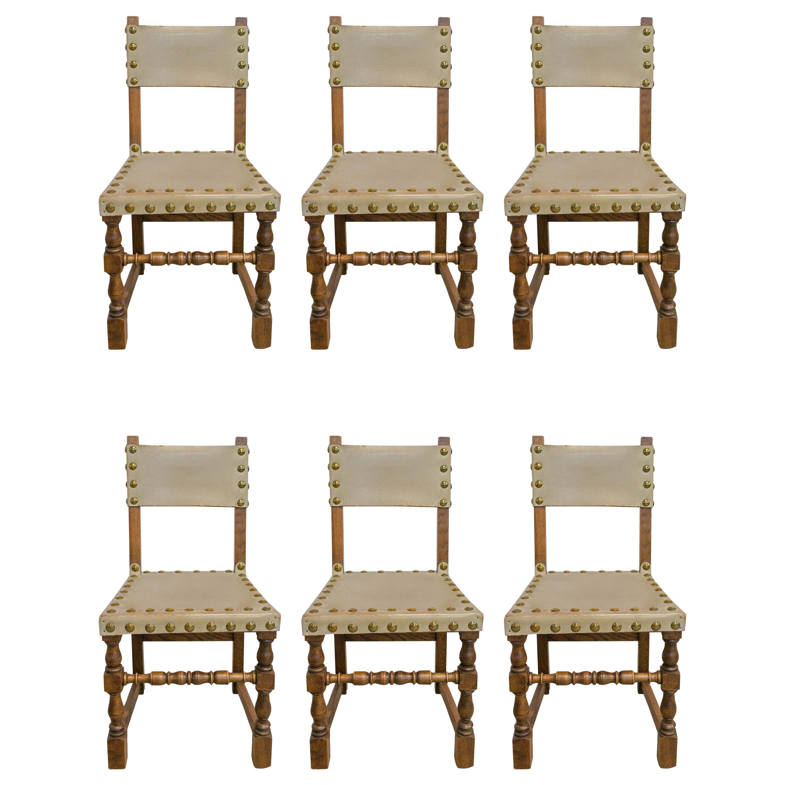 Six dining chairs vintage 20th century Spanish leather brass studs oak
