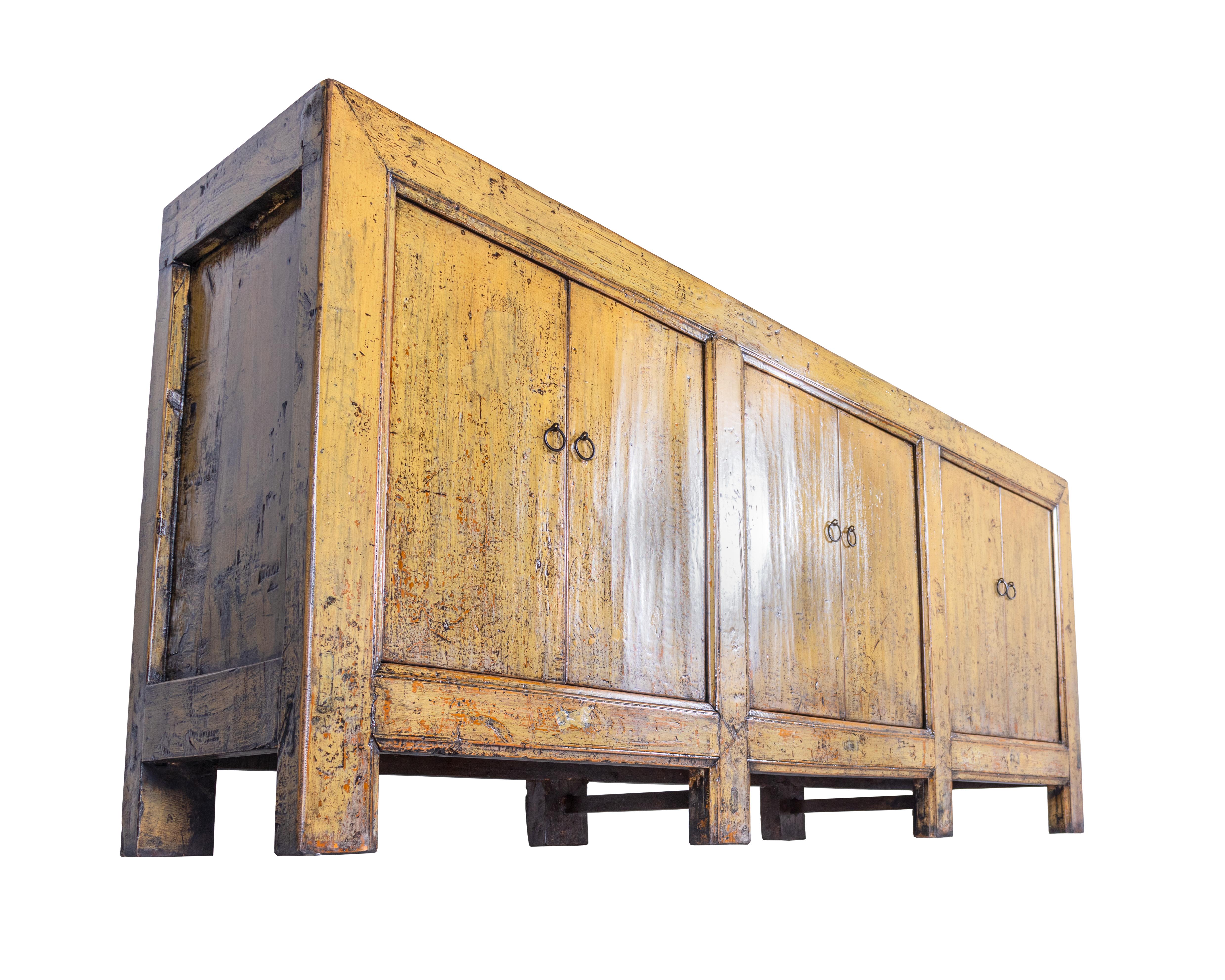 Six door server credenza in a mustard / yellow tone paint patina with lacquer glaze. Made from reclaimed Elm wood. In my organic, contemporary, vintage and mid-century modern aesthetic.

Part of our one of a kind Le Monde collection. Exclusive to