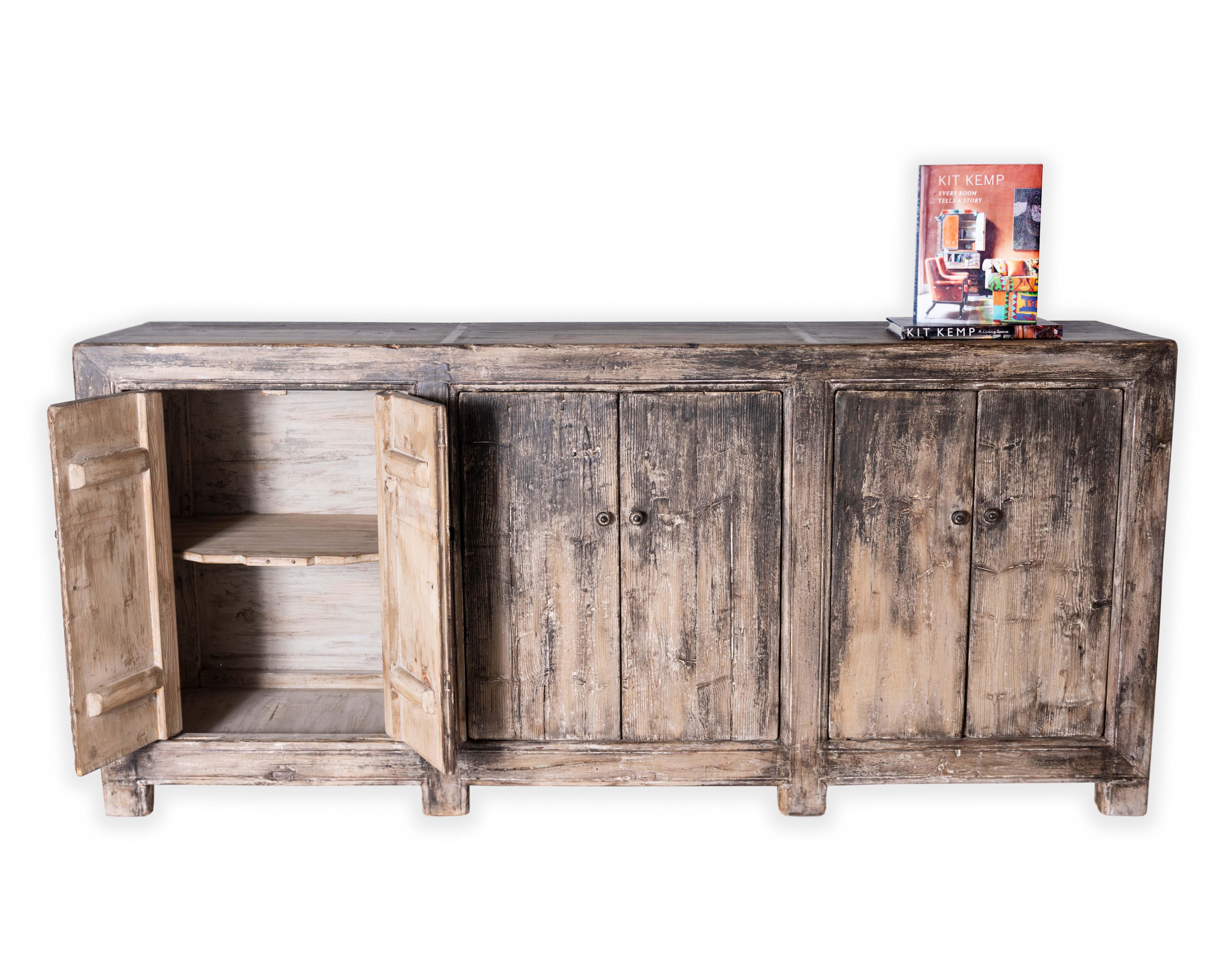 Unfinished wooden six door sideboard with weathered knobs.

This piece is a part of Brendan Bass’s one-of-a-kind collection, Le Monde. French for “The World”, the Le Monde collection is made up of rare and hard to find pieces curated by Brendan from