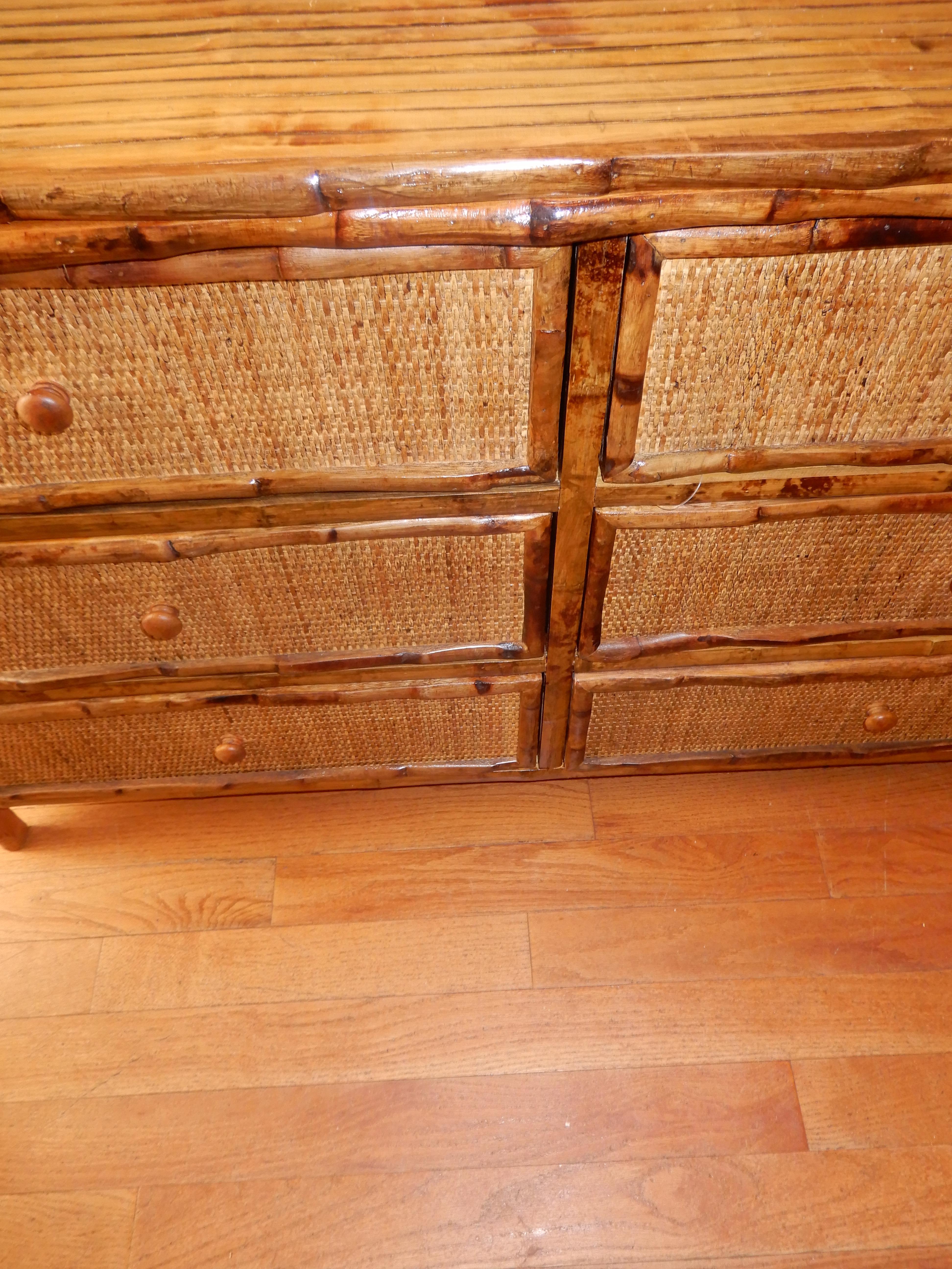 A handcrafted six-drawer dresser. Bamboo and cane, all drawers are on slides and pullout easily, cane fronts and solid torched bamboo trims. A transitional piece that will with many different settings.