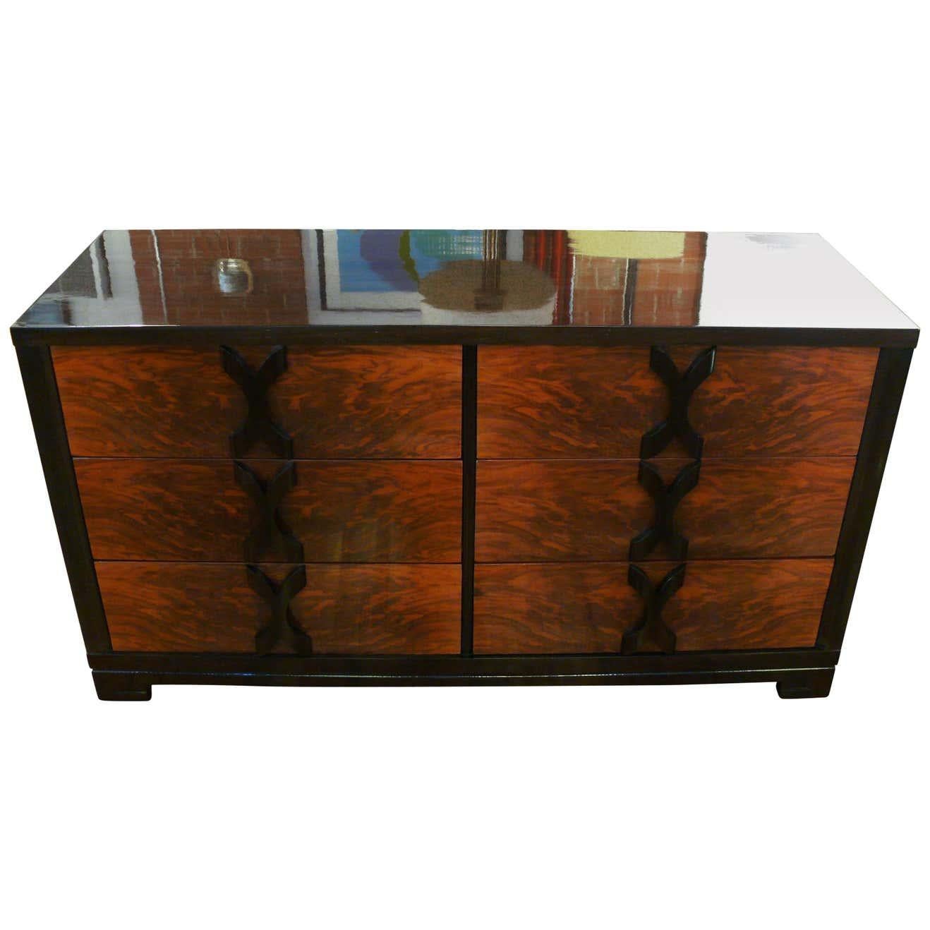 1940s Modernage walnut six-drawer dresser in the manner of James Mont with elegant rosewood 