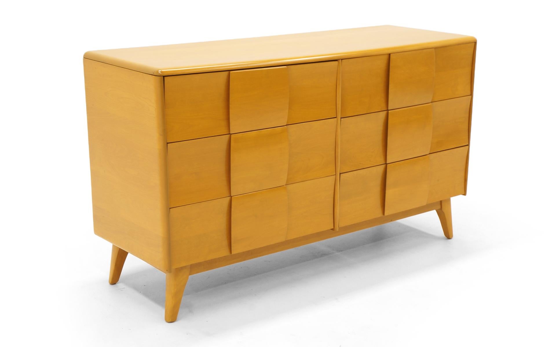 Heywood Wakefield six-drawer dresser in Wheat finish. The Sculptura line is the only Heywood Wakefield designs we buy and sell. Striking looks and great functionality. Solid birch construction. We have a listing for the same dresser in Champagne