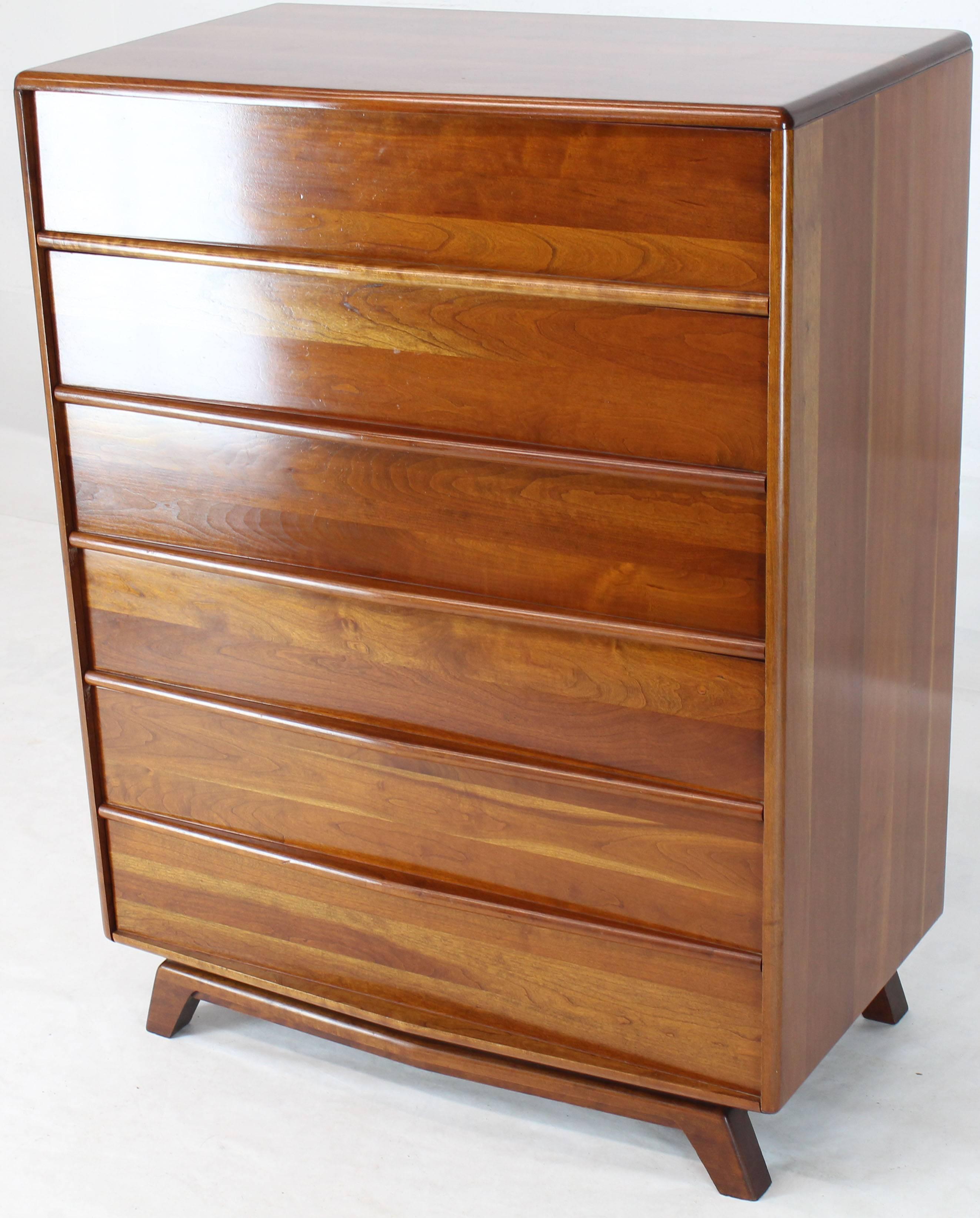 Beautiful wood pattern Mid-Century Modern design solid cherrywood high chest.