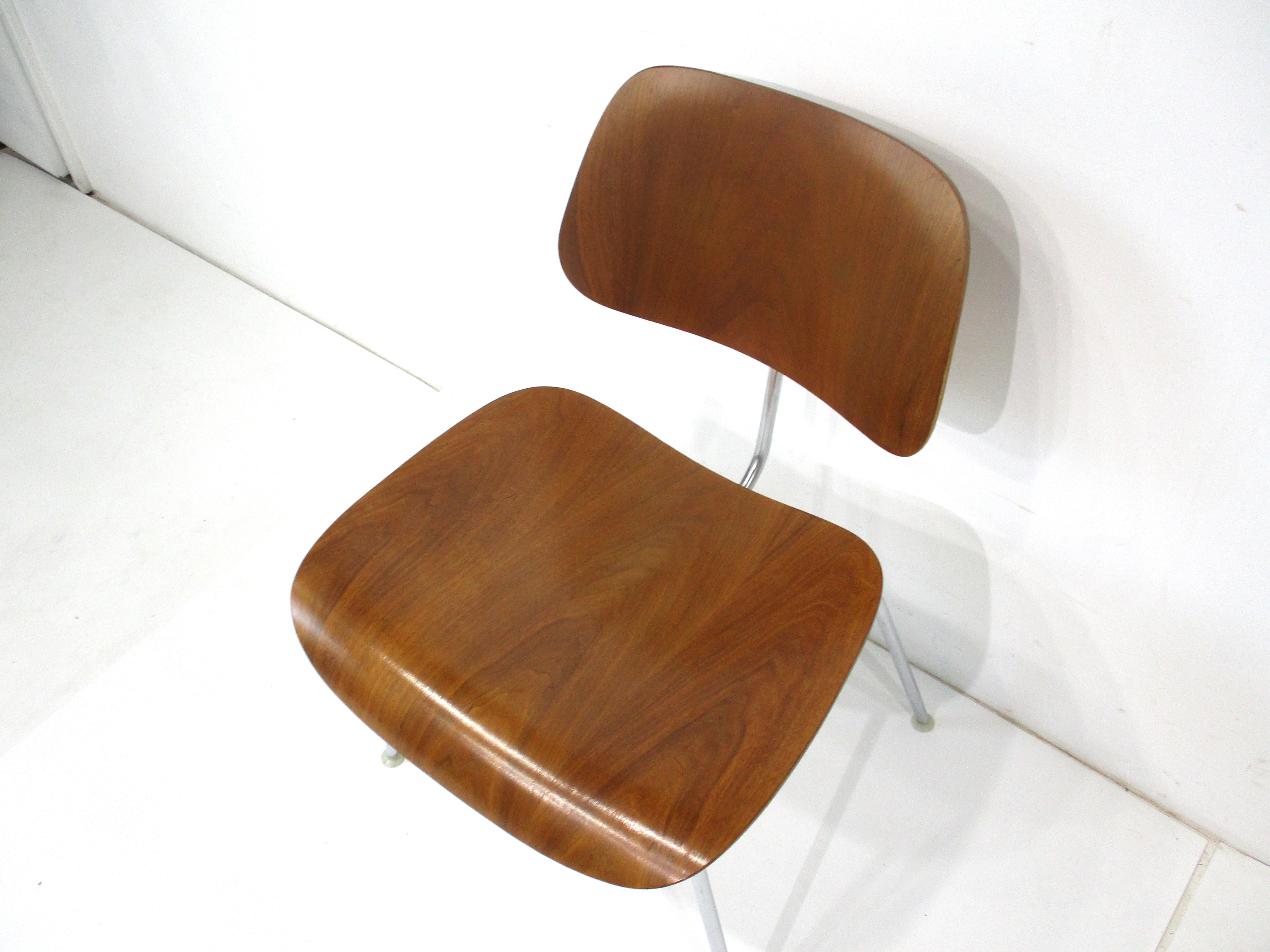Six Eames Walnut DCM Dining Chairs for Herman Miller 2