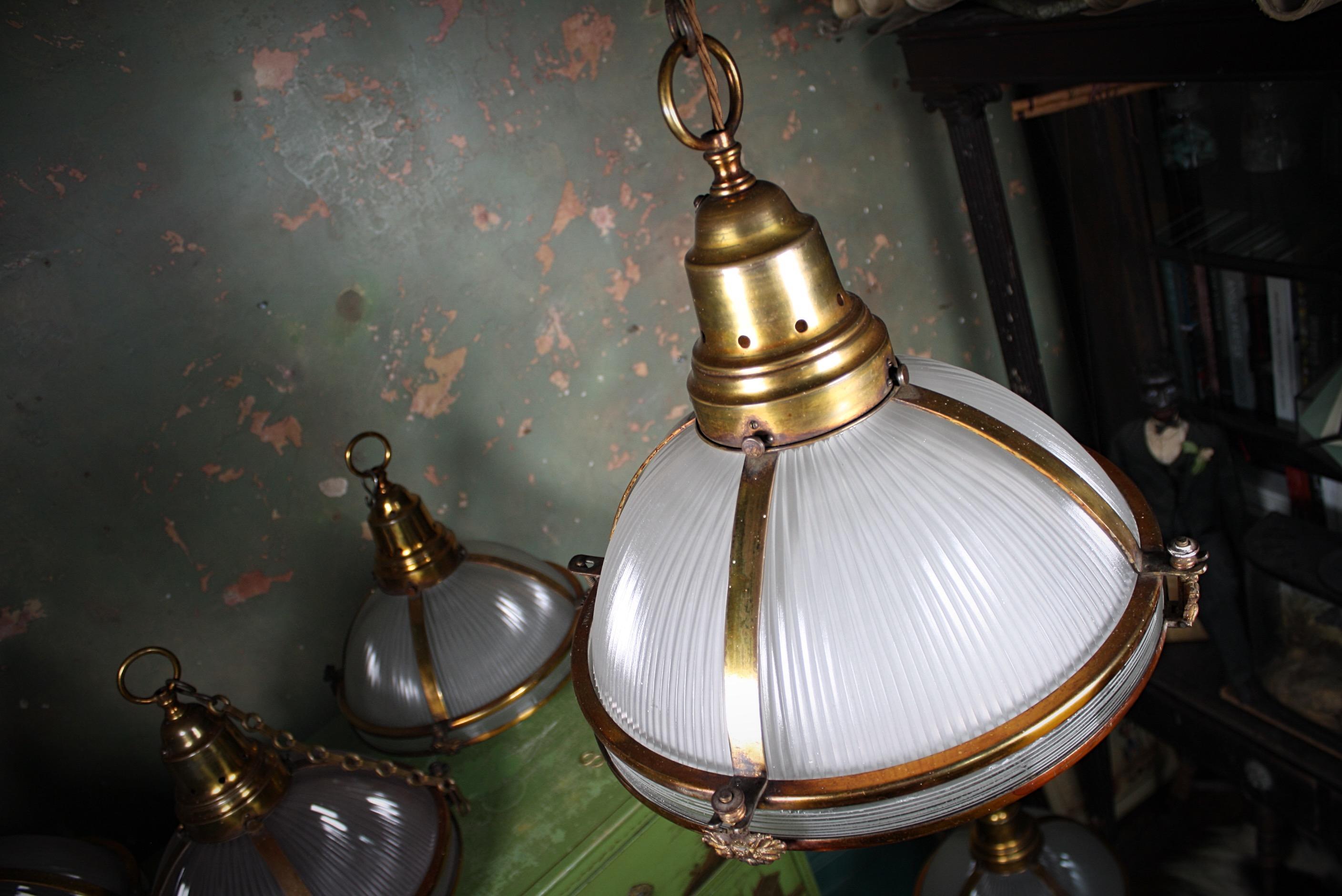 Six Extra Large Holophane Prismatic Glass and Copper Gilt Caged Pendants Lights 4