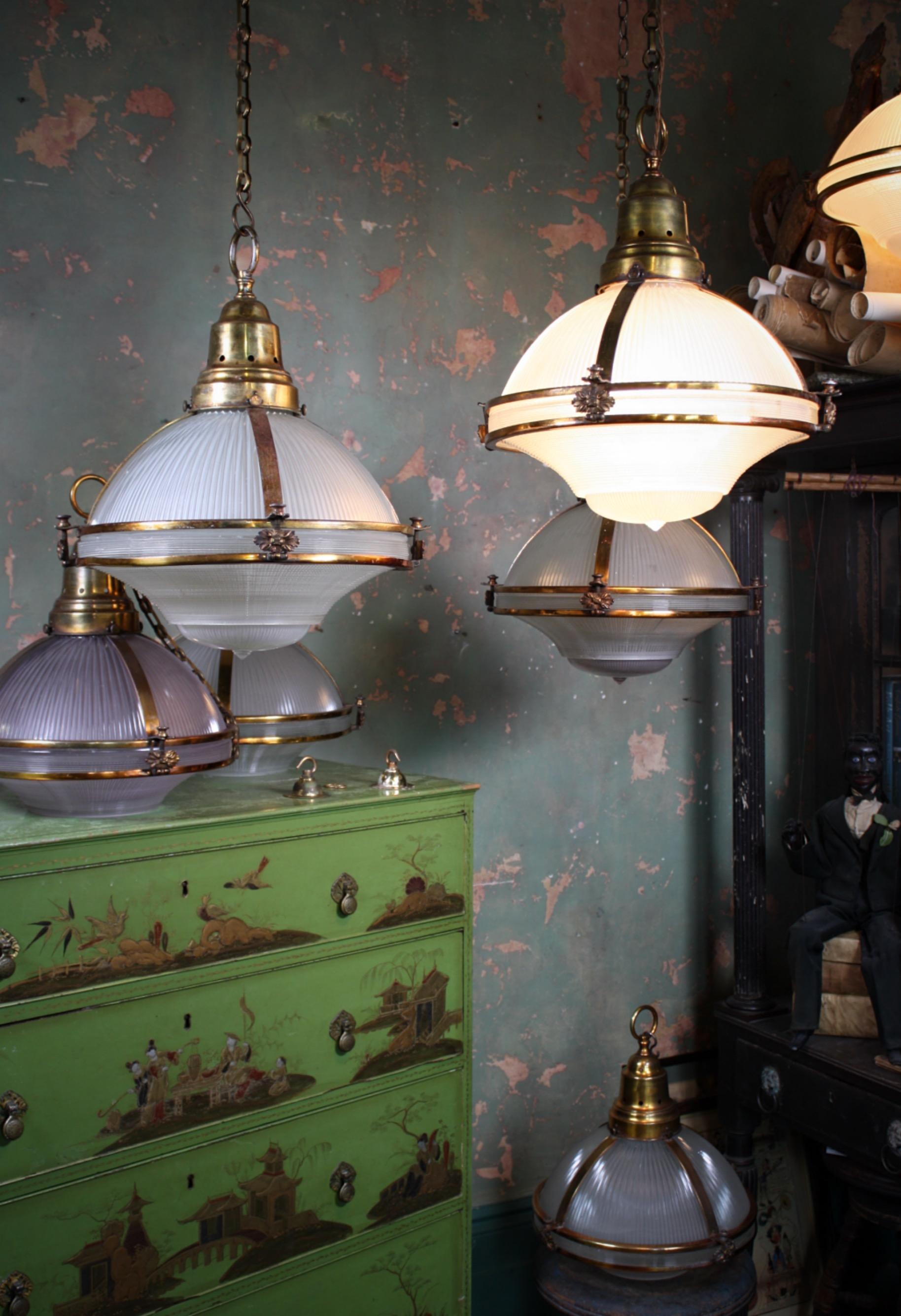 French Six Extra Large Holophane Prismatic Glass and Copper Gilt Caged Pendants Lights