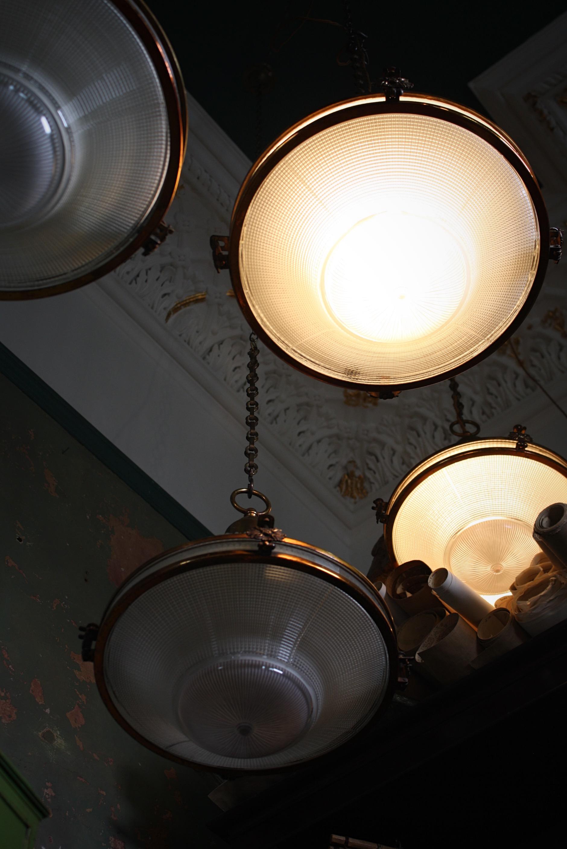 20th Century Six Extra Large Holophane Prismatic Glass and Copper Gilt Caged Pendants Lights