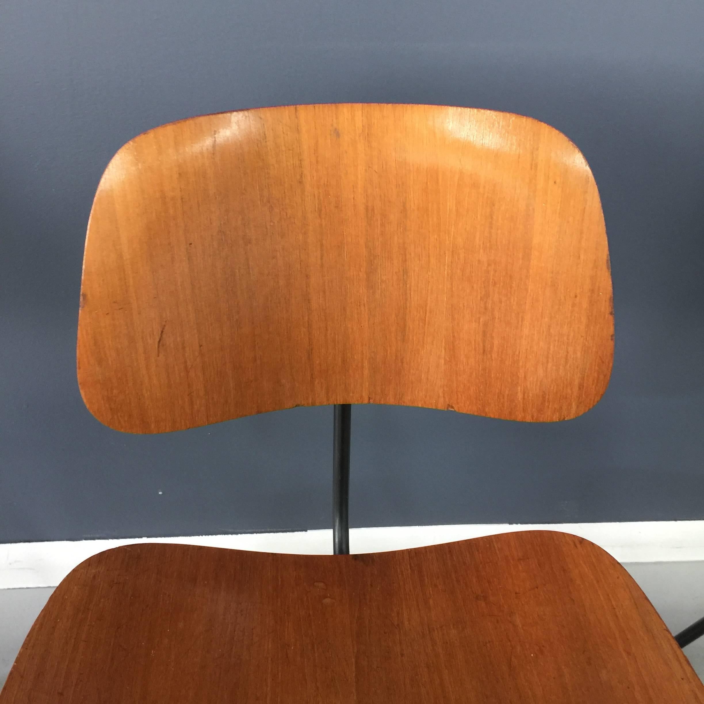 Set of six early (late 1950s-early 1960s) Eames DCM chairs. Some retain their original label. All sturdy and intact. Condition ranges from excellent to scratched (see photos for best and worst chairs). One has oxidation on the leg.