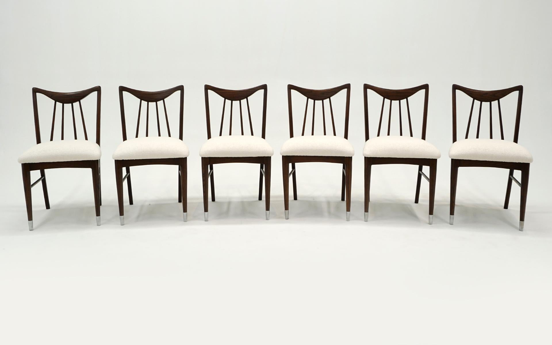 Set of 6 armless dining side chairs by Edmond / Edmund Spence for Keller.  These have been expertly refinished and reupholstered in an off white boucle.  Original chrome sabots on the front legs of each chair.  Great set, ready to ship.