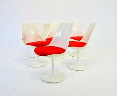 Six Eero Saarinen for Knoll Tulip Group Dining Chairs with Red Cushions
