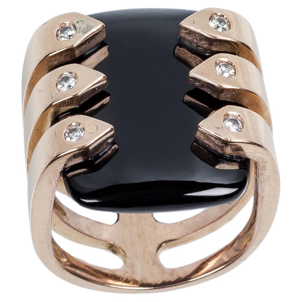 Sechs Augen, die Onyx und Diamanten in Roségold betrachten  Ring im Angebot